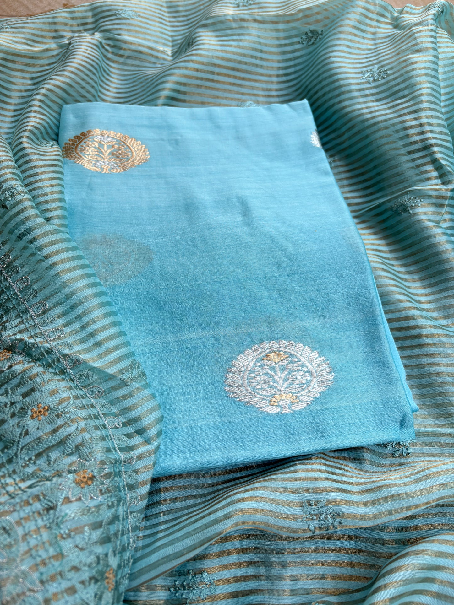Blue handloom silk kurta, bottom tissue kadhwa dupatta.