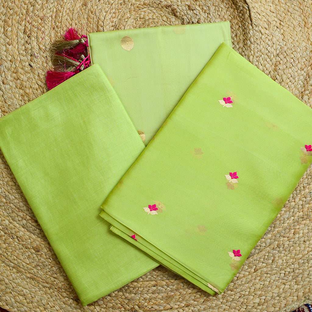 Green kora silk suit with pink shaded dupatta