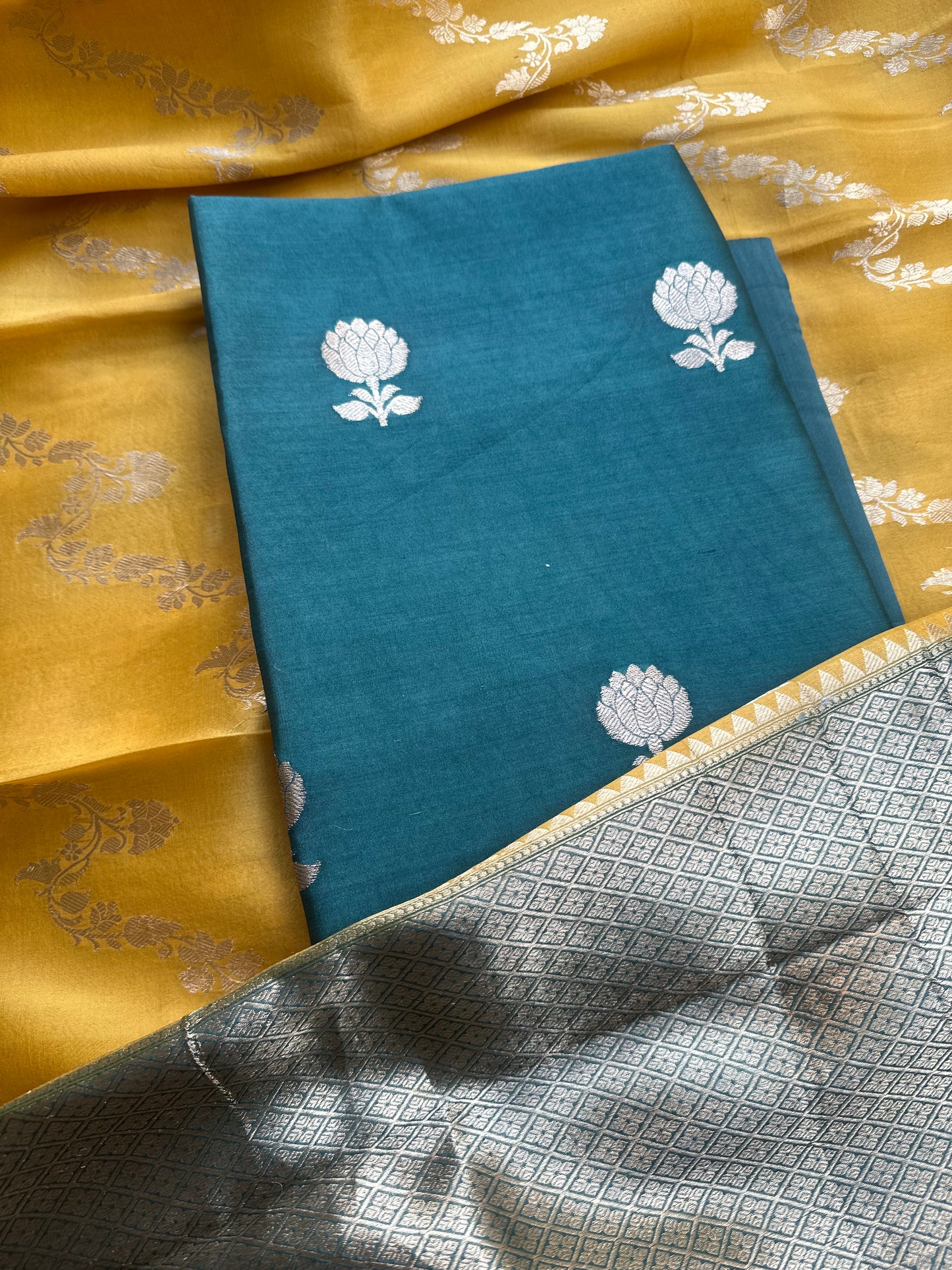 Green chiniya silk kurta, kora shaded dupatta, plain bottom.