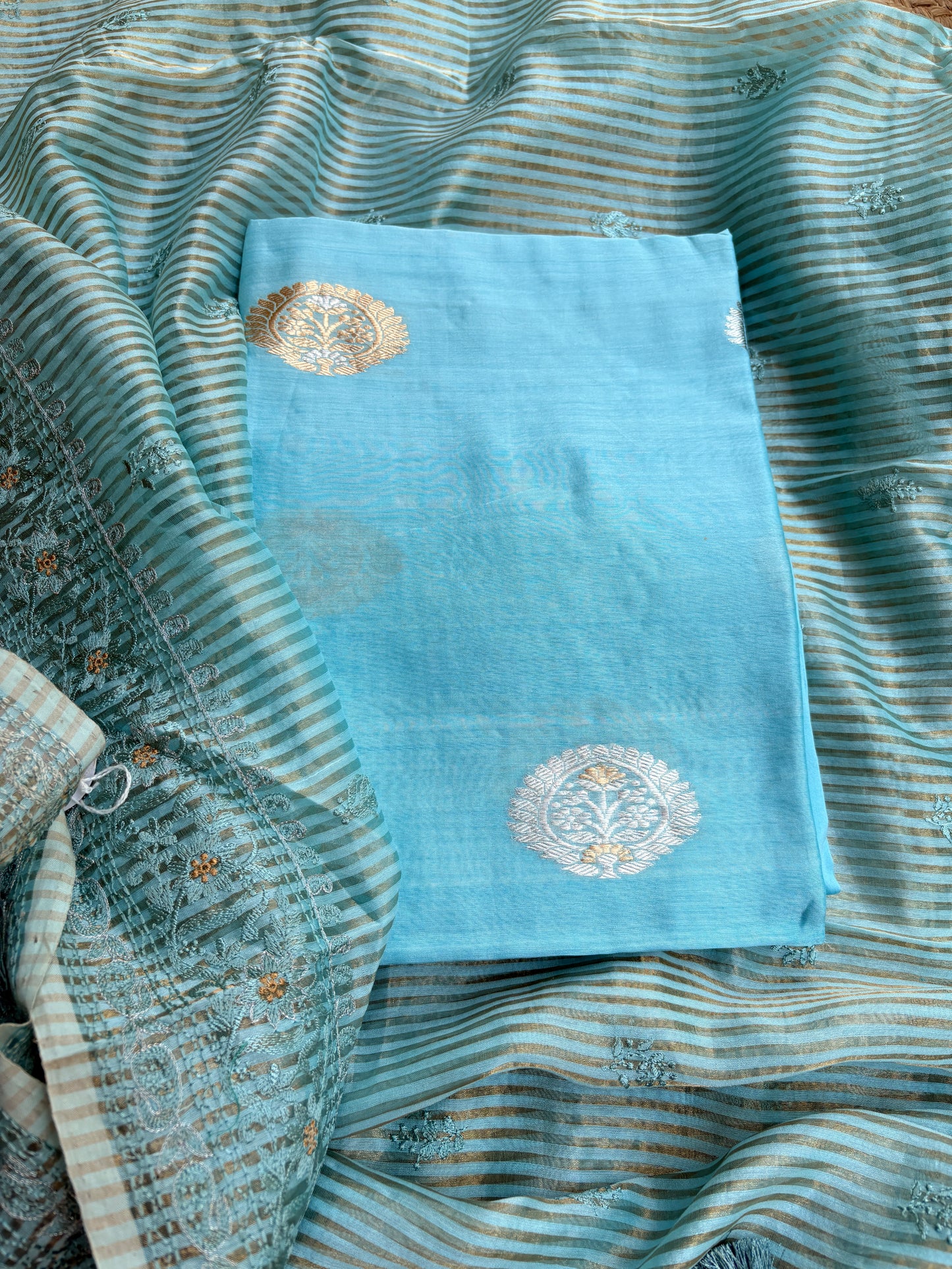 Blue handloom silk kurta, bottom tissue kadhwa dupatta.