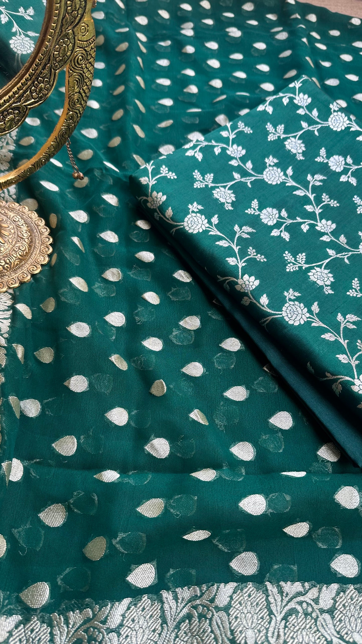 Green chiniya silk kurta, georgette dupatta, plain bottom.