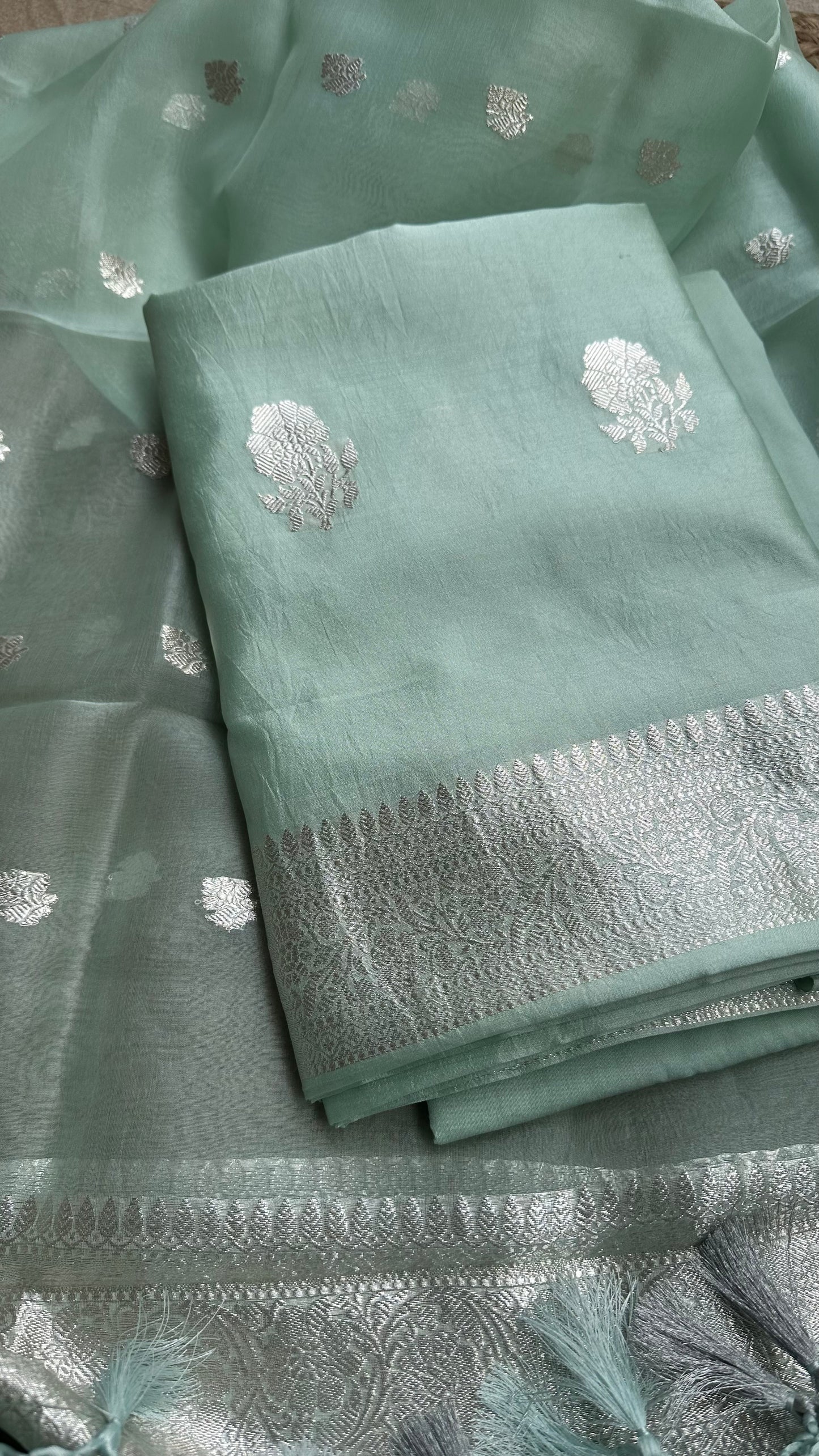 Pastel green pure silver chiniya silk suit, kora silk dupatta, plain silk bottom.
