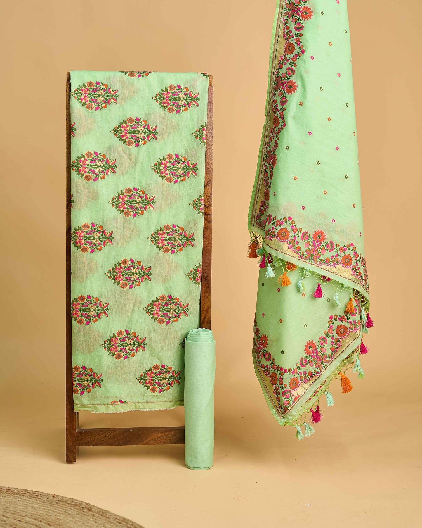 Green chanderi meendar kurta, dupatta and plain bottom.