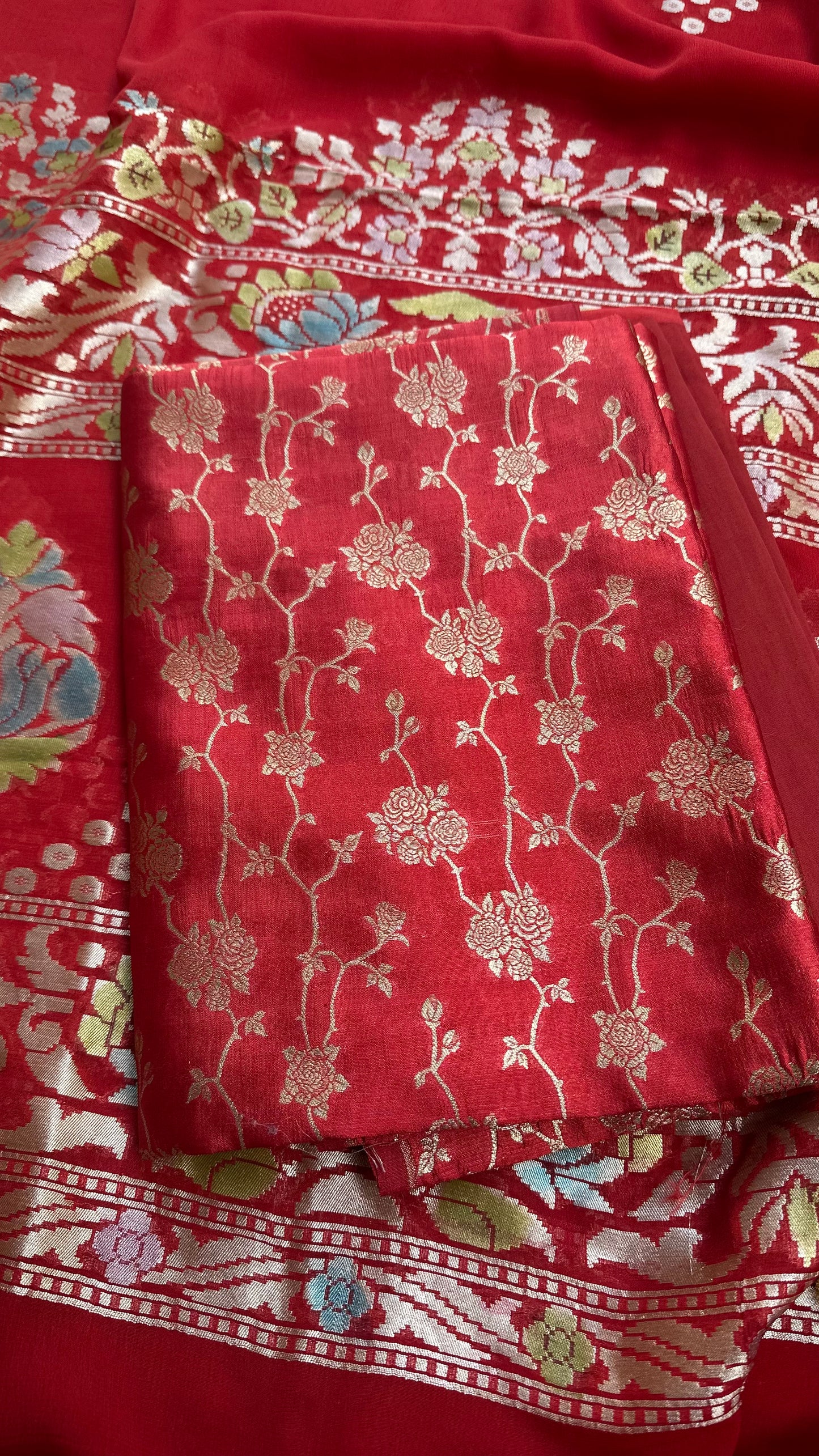 Red chiniya silk kurta,khaddi georgette meenadar dupatta. Plain bottom