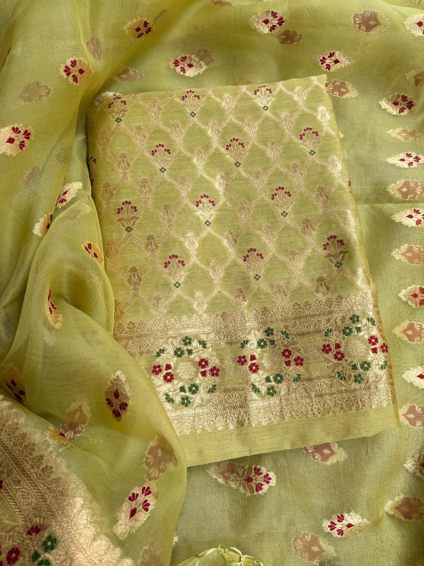 Green moonga silk kurta, kora kadhwa silk dupatta , plain bottom