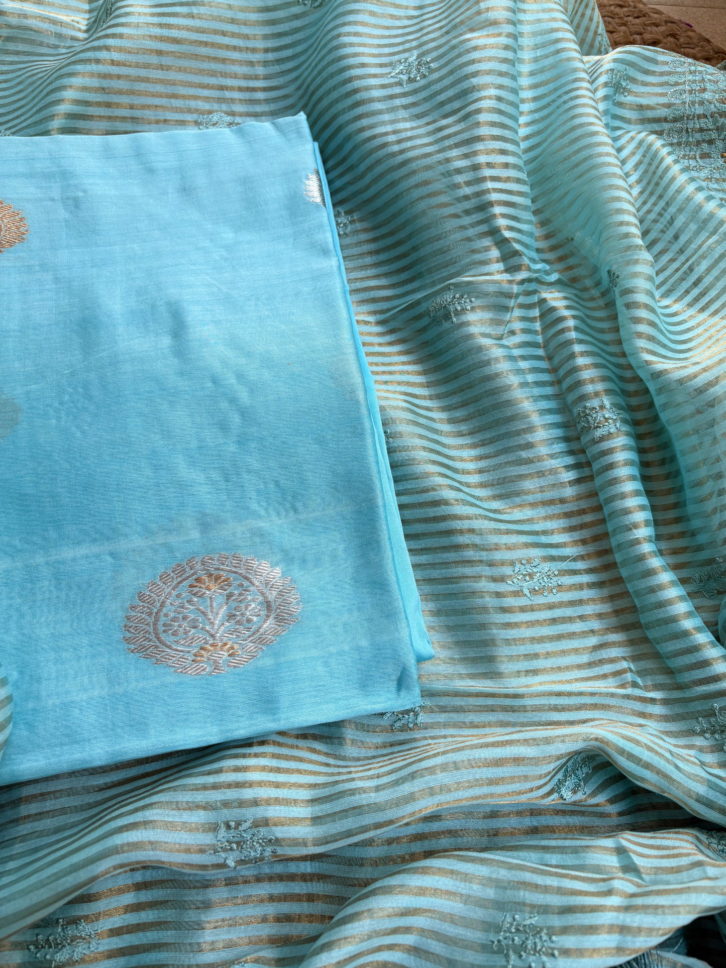 Blue handloom silk kurta, bottom tissue kadhwa dupatta.