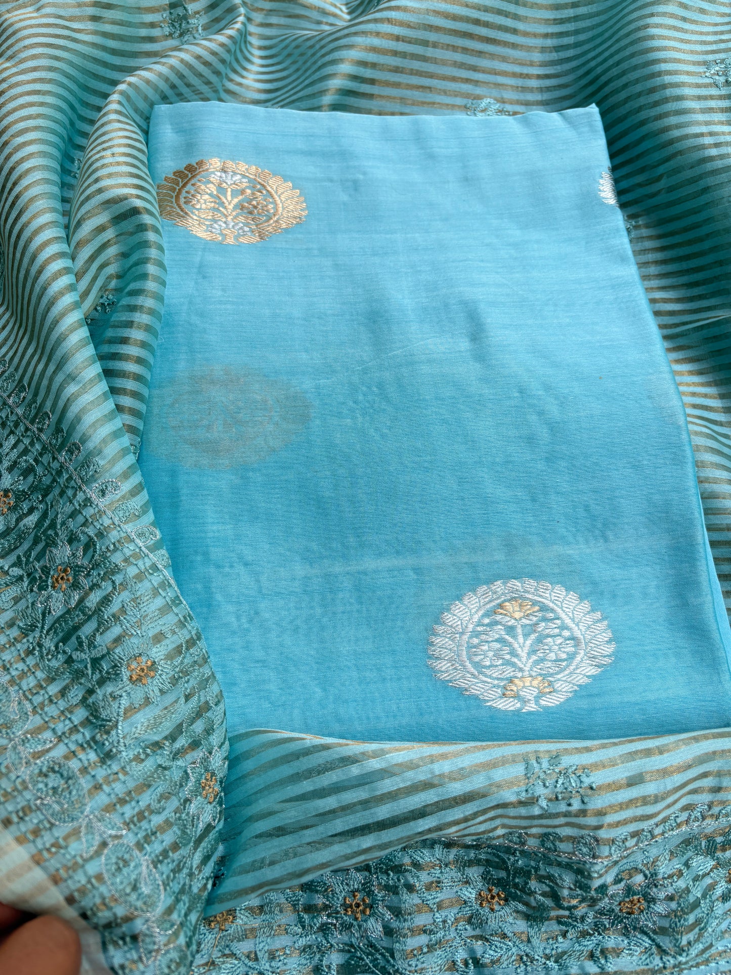 Blue handloom silk kurta, bottom tissue kadhwa dupatta.