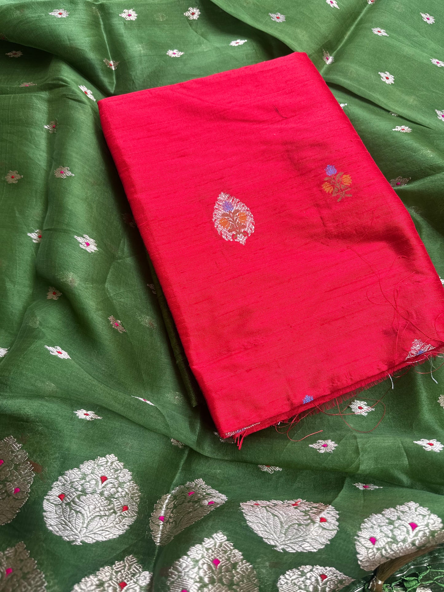 Red raw silk kurta, green kora silk dupatta, plain raw silk bottom