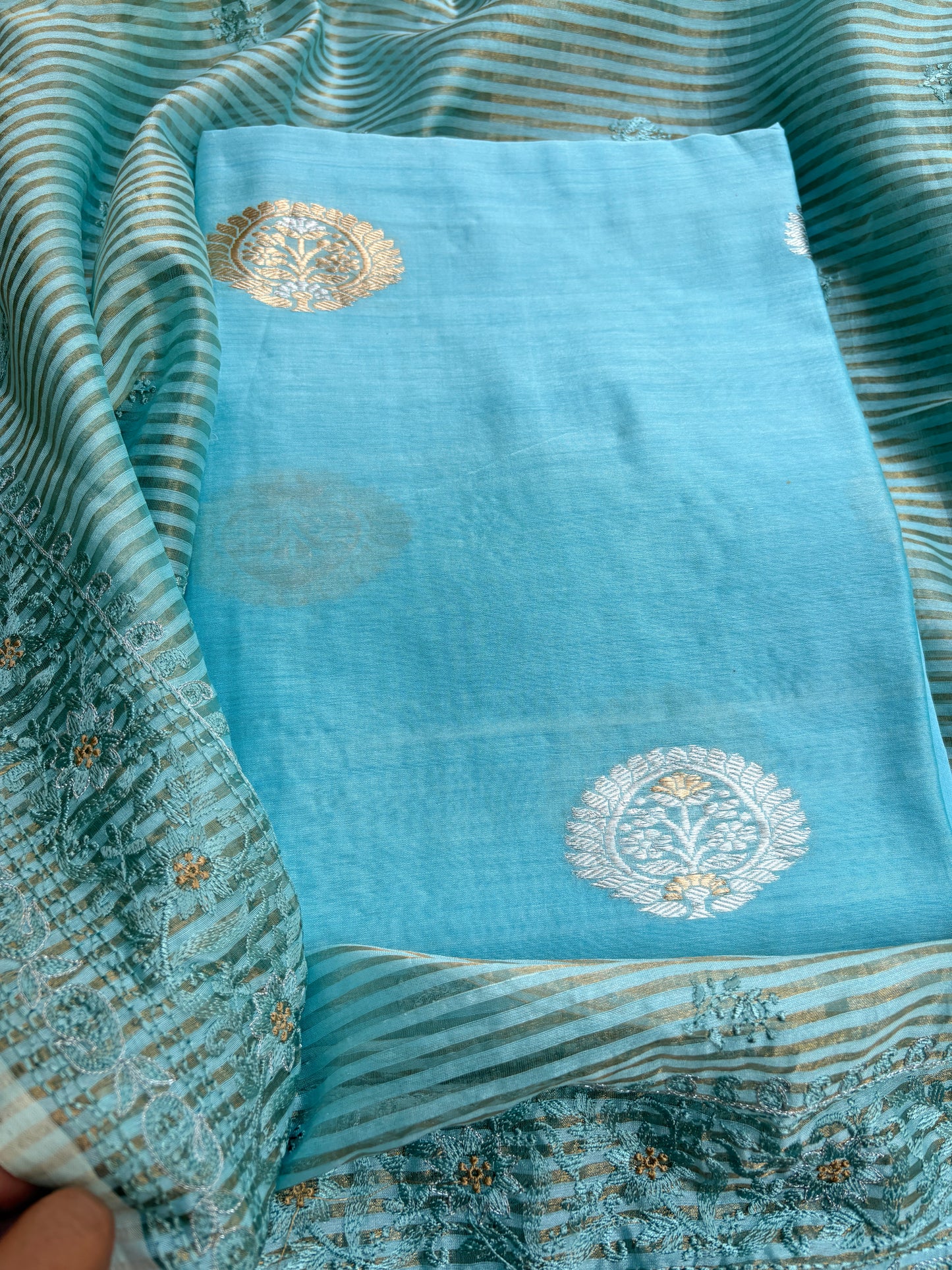 Blue handloom silk kurta, bottom tissue kadhwa dupatta.