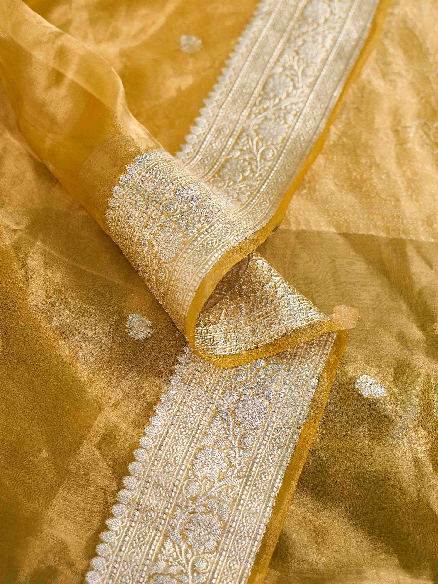 Yellow golden silver zari tissue saree
