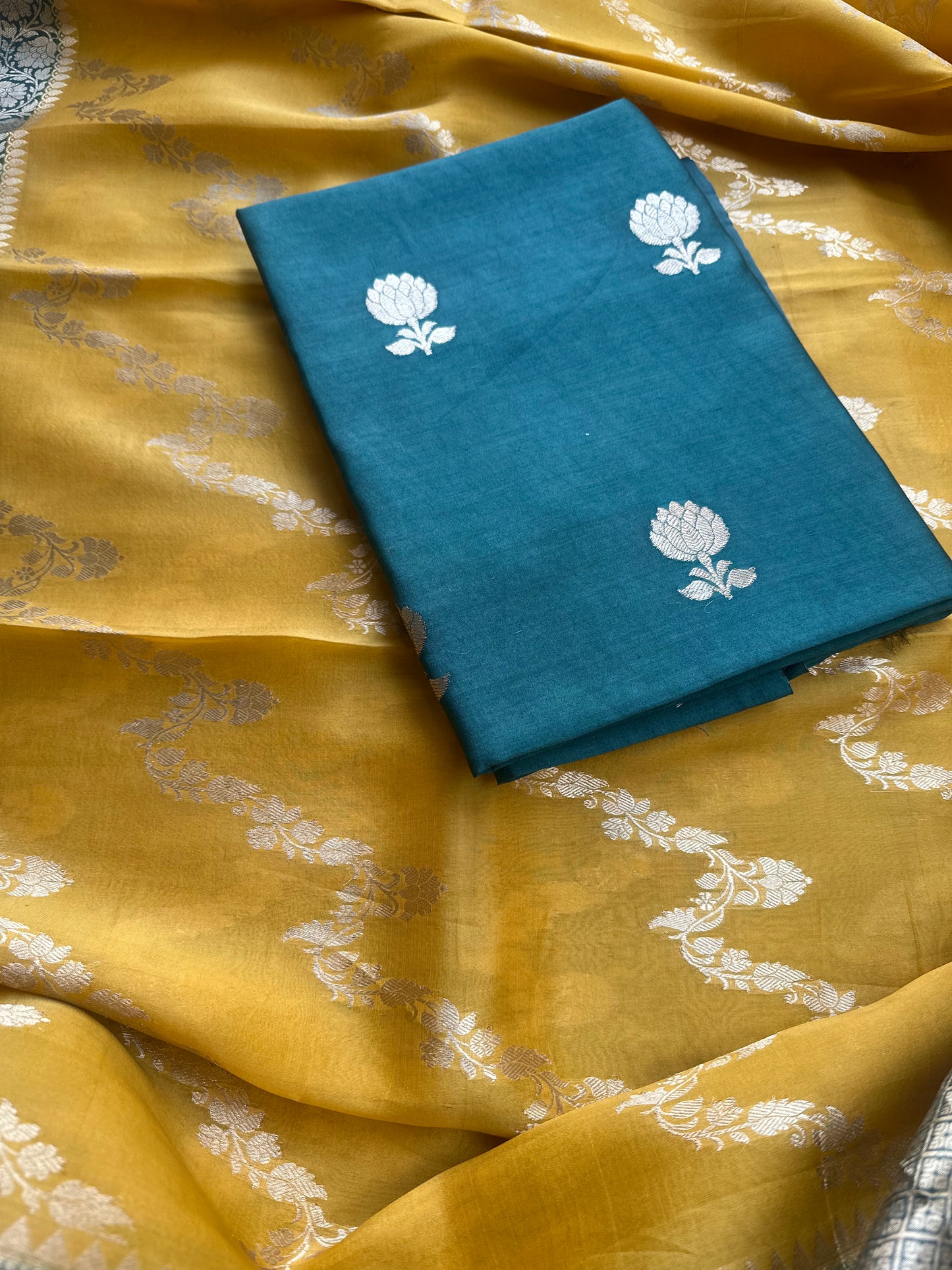 Green chiniya silk kurta, kora shaded dupatta, plain bottom.