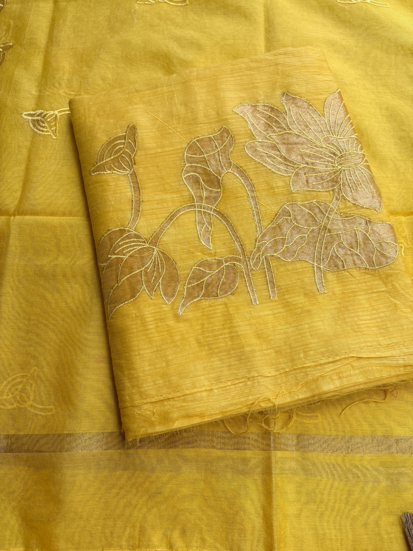 Yellow mul Chanderi appliqué work suit set