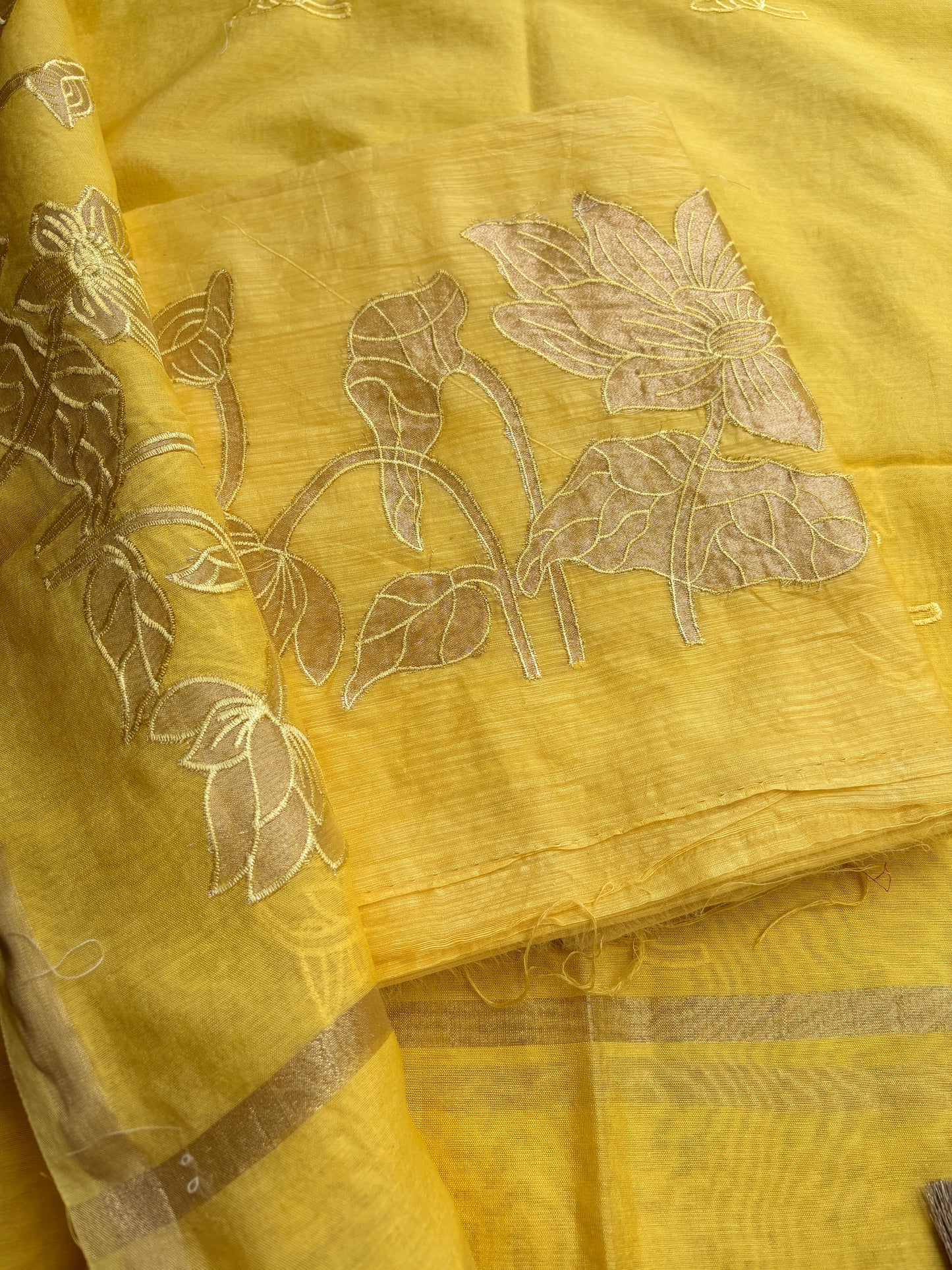 Yellow mul Chanderi appliqué work suit set