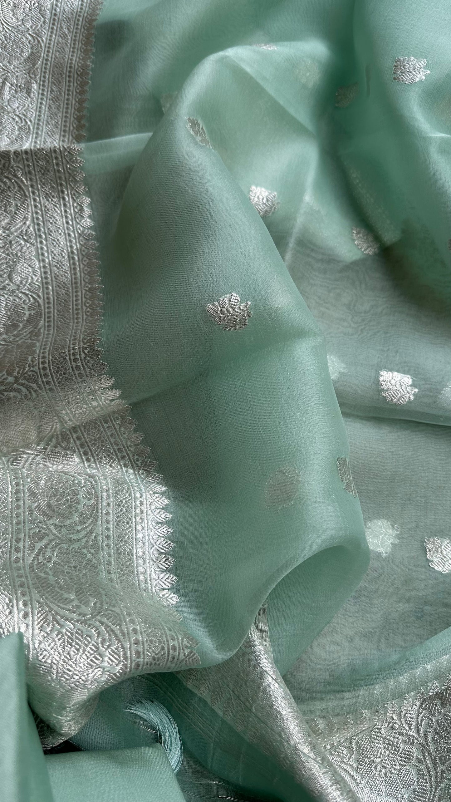 Pastel green pure silver chiniya silk suit, kora silk dupatta, plain silk bottom.