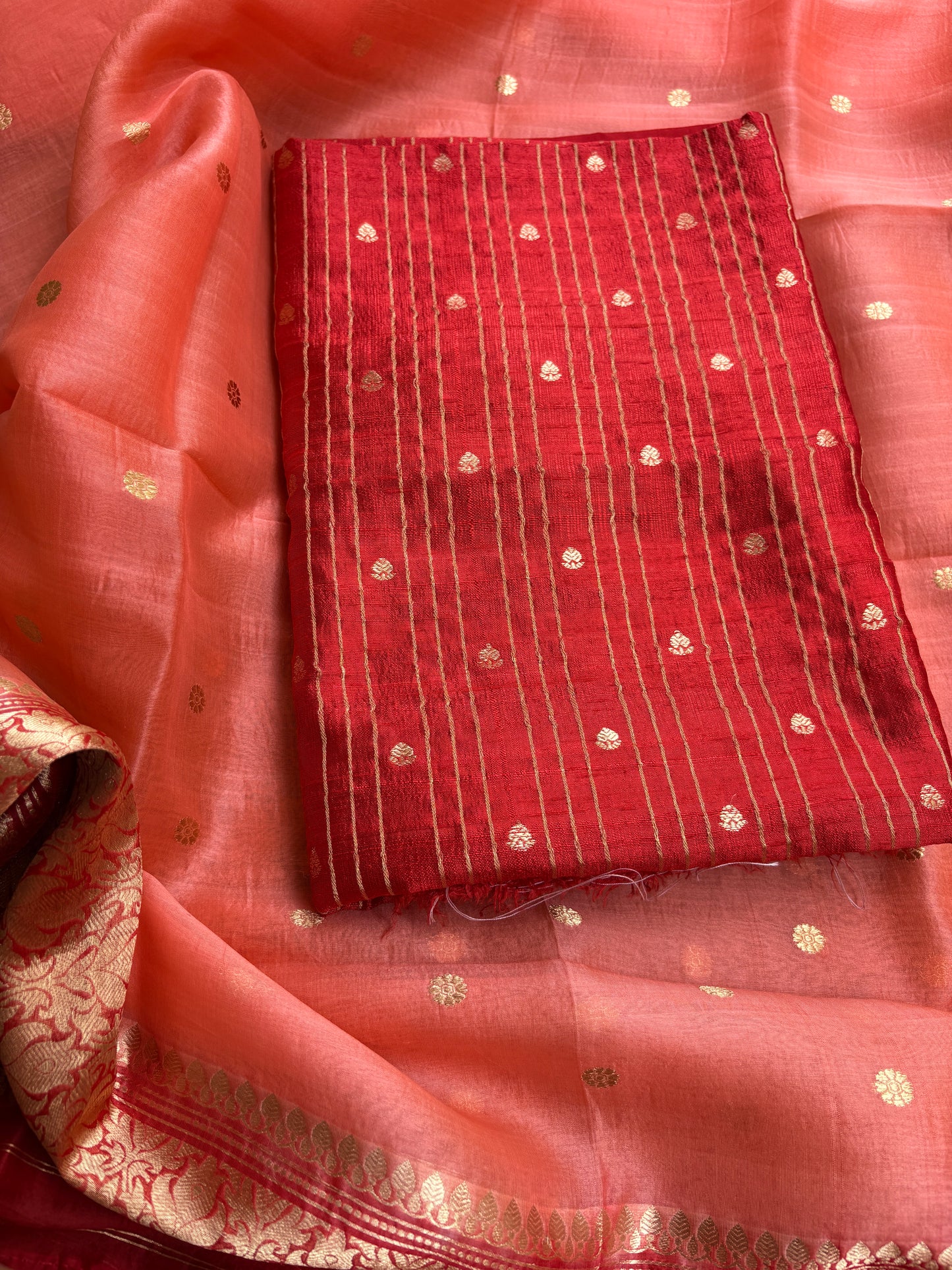 Red raw silk kurta, bottom and kora silk shaded dupatta