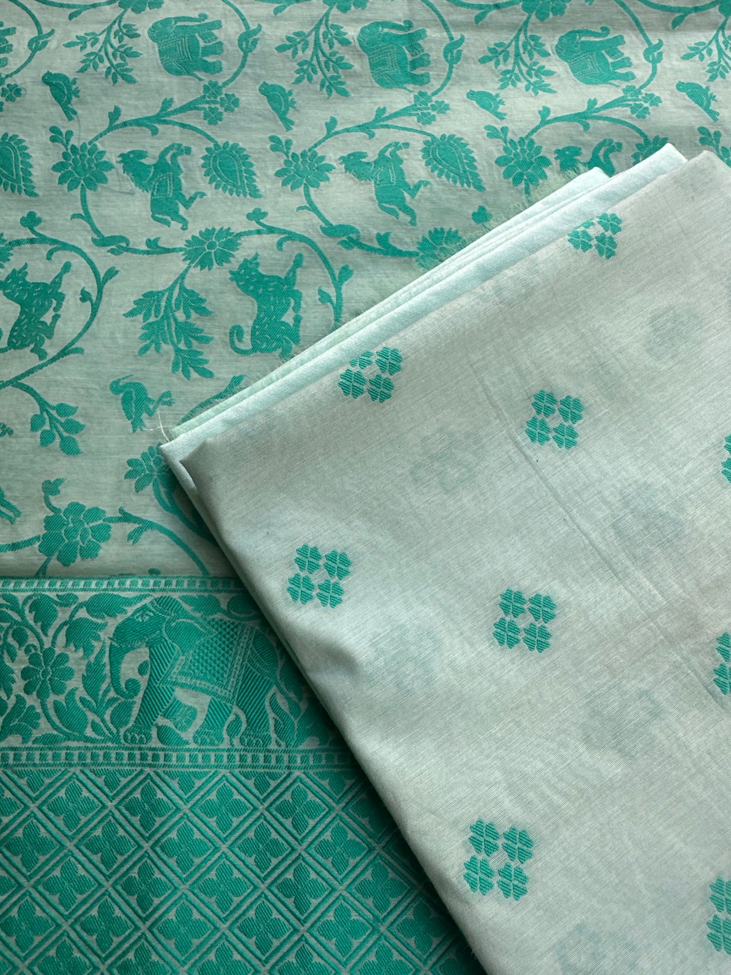 Sea green booti kurta, shikargah dupatta, plain bottom