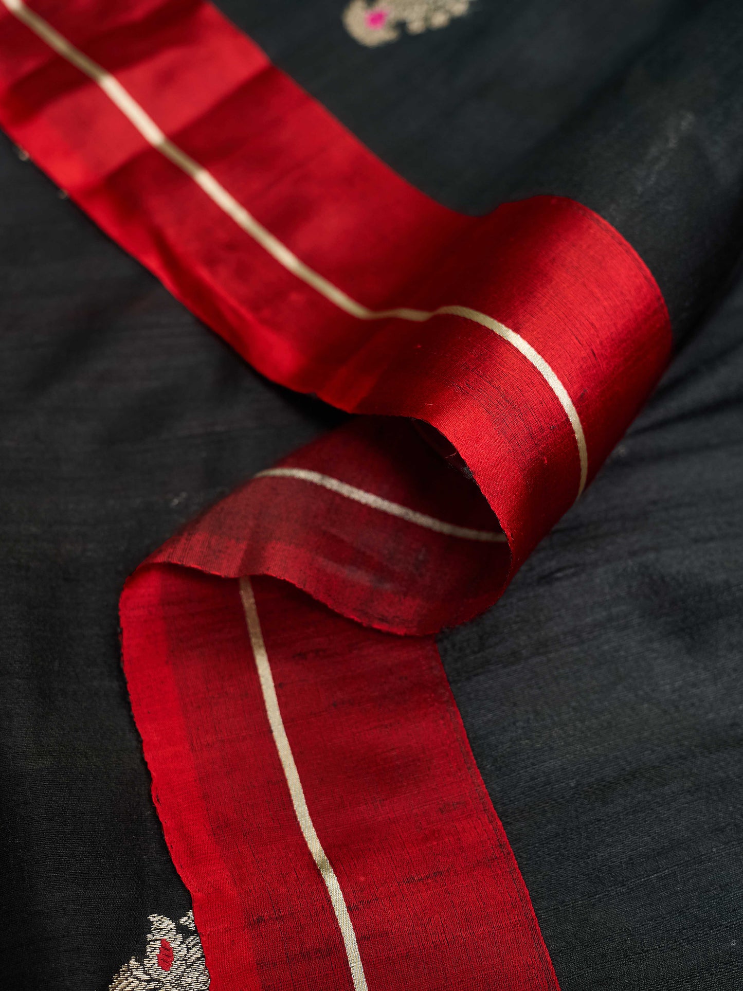 Black meendar booti with red satin border saree