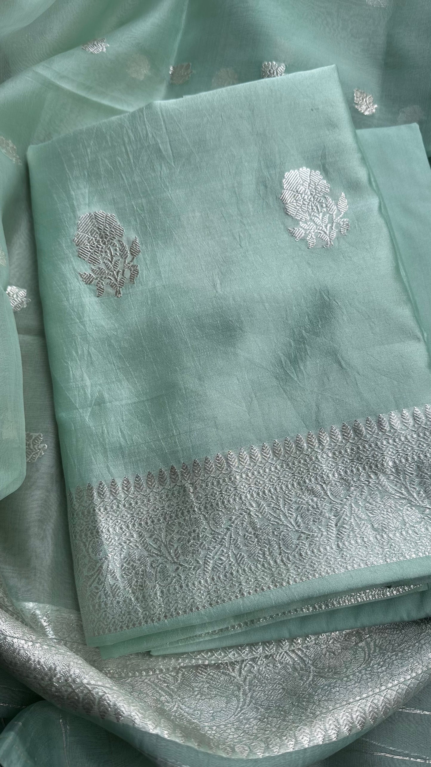 Pastel green pure silver chiniya silk suit, kora silk dupatta, plain silk bottom.