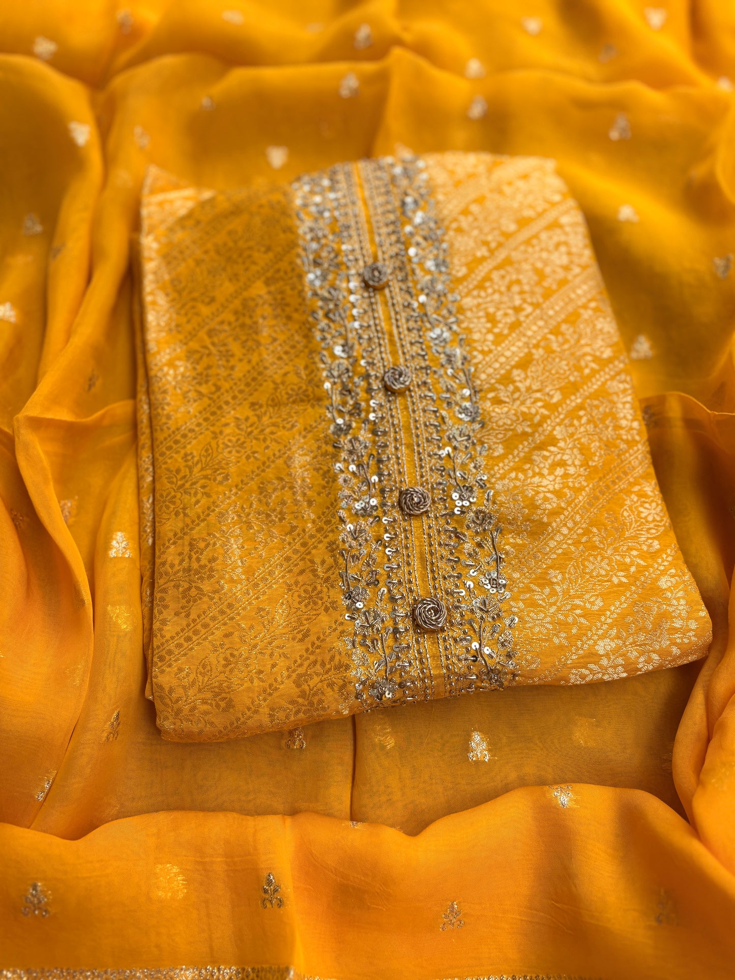 Yellow silk hand embroidered suit set.