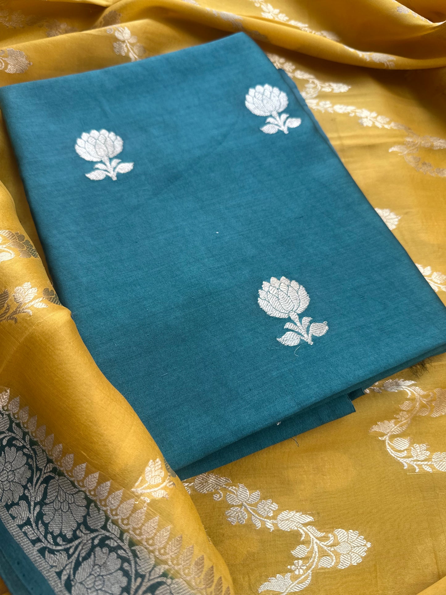 Green chiniya silk kurta, kora shaded dupatta, plain bottom.