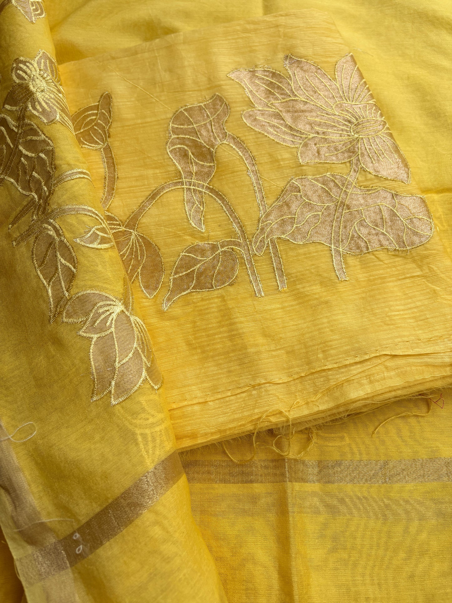 Yellow mul Chanderi appliqué work suit set