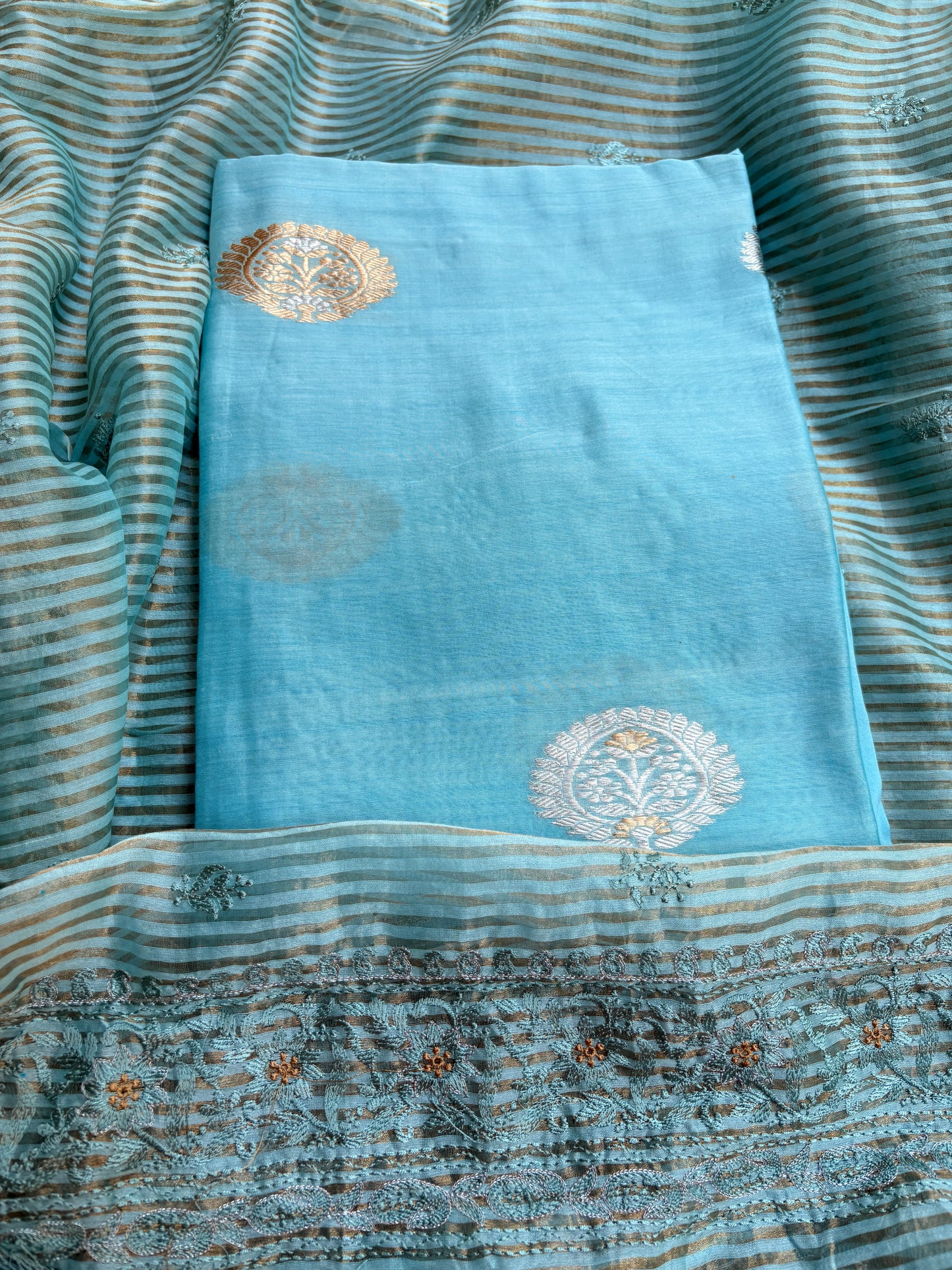 Blue handloom silk kurta, bottom tissue kadhwa dupatta.
