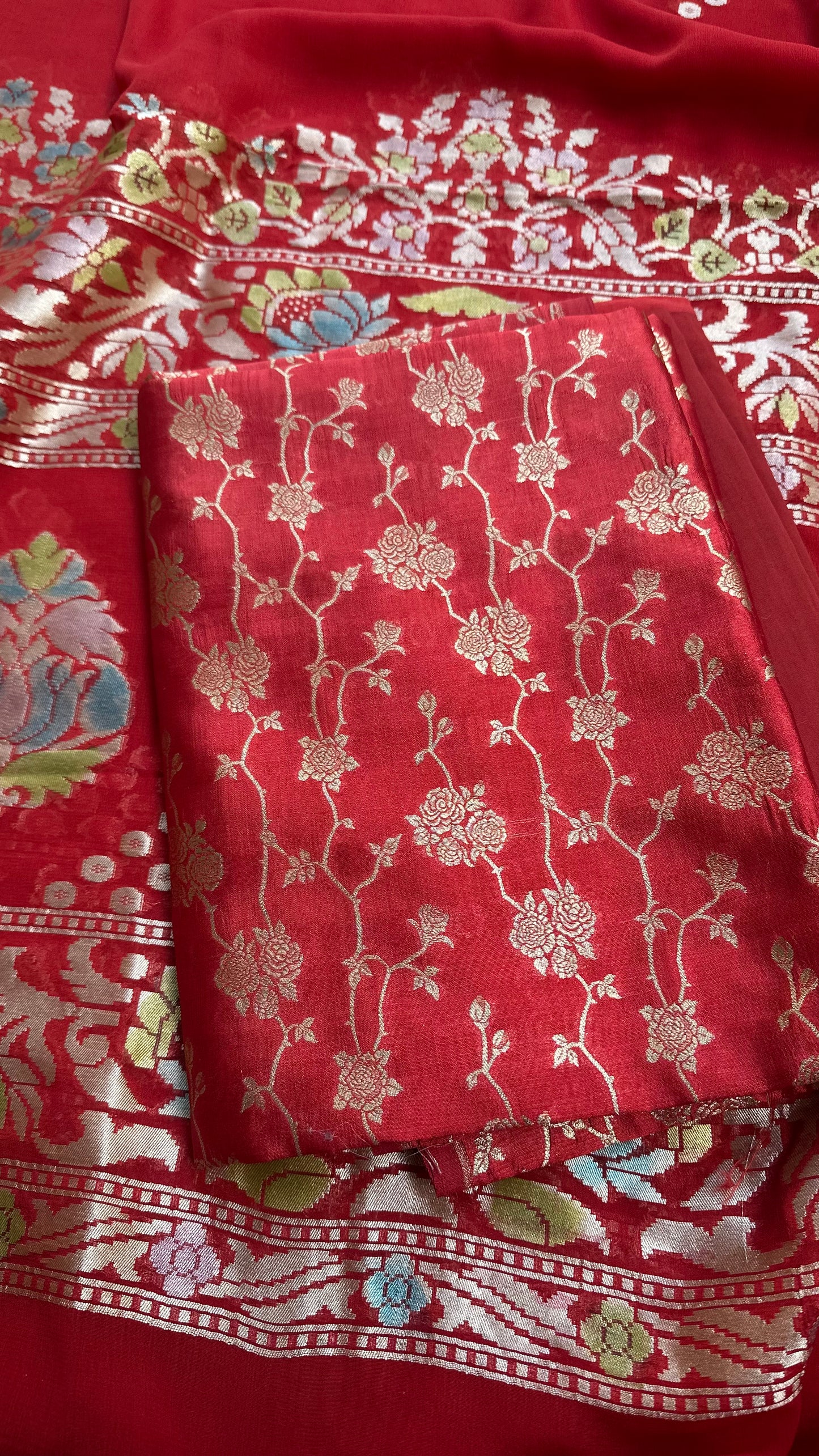 Red chiniya silk kurta,khaddi georgette meenadar dupatta. Plain bottom