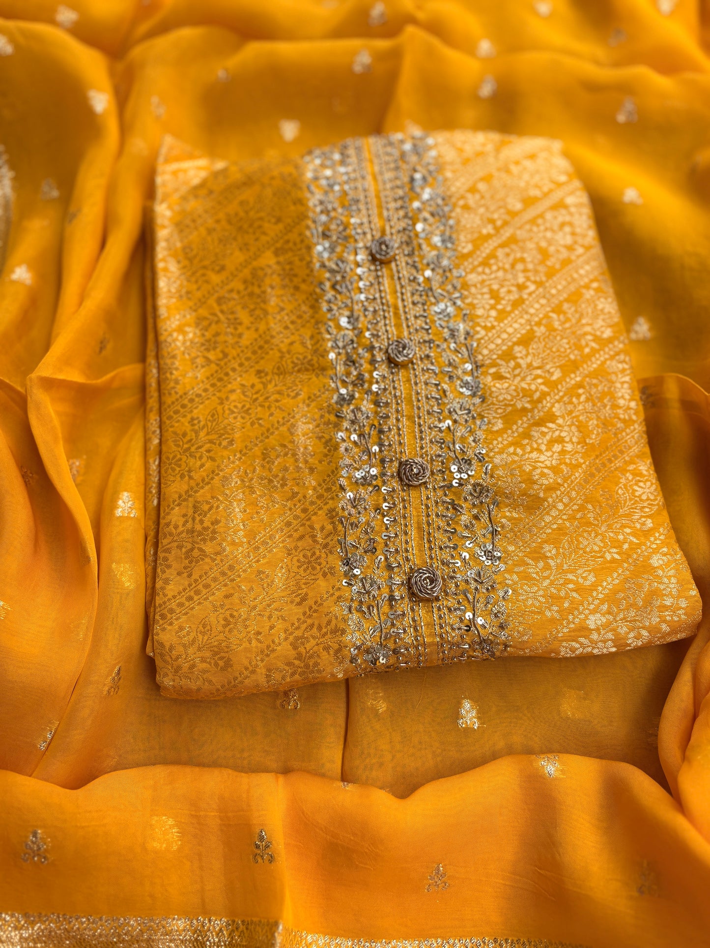 Yellow silk hand embroidered suit set.