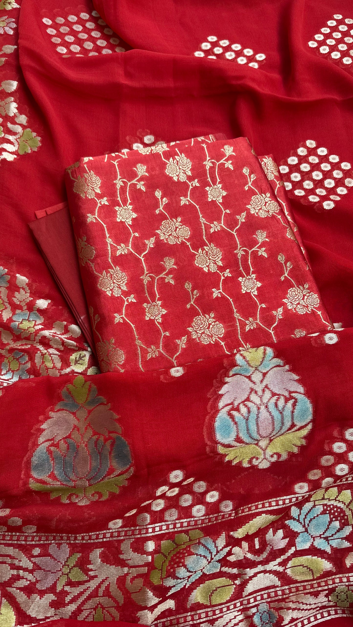 Red chiniya silk kurta,khaddi georgette meenadar dupatta. Plain bottom