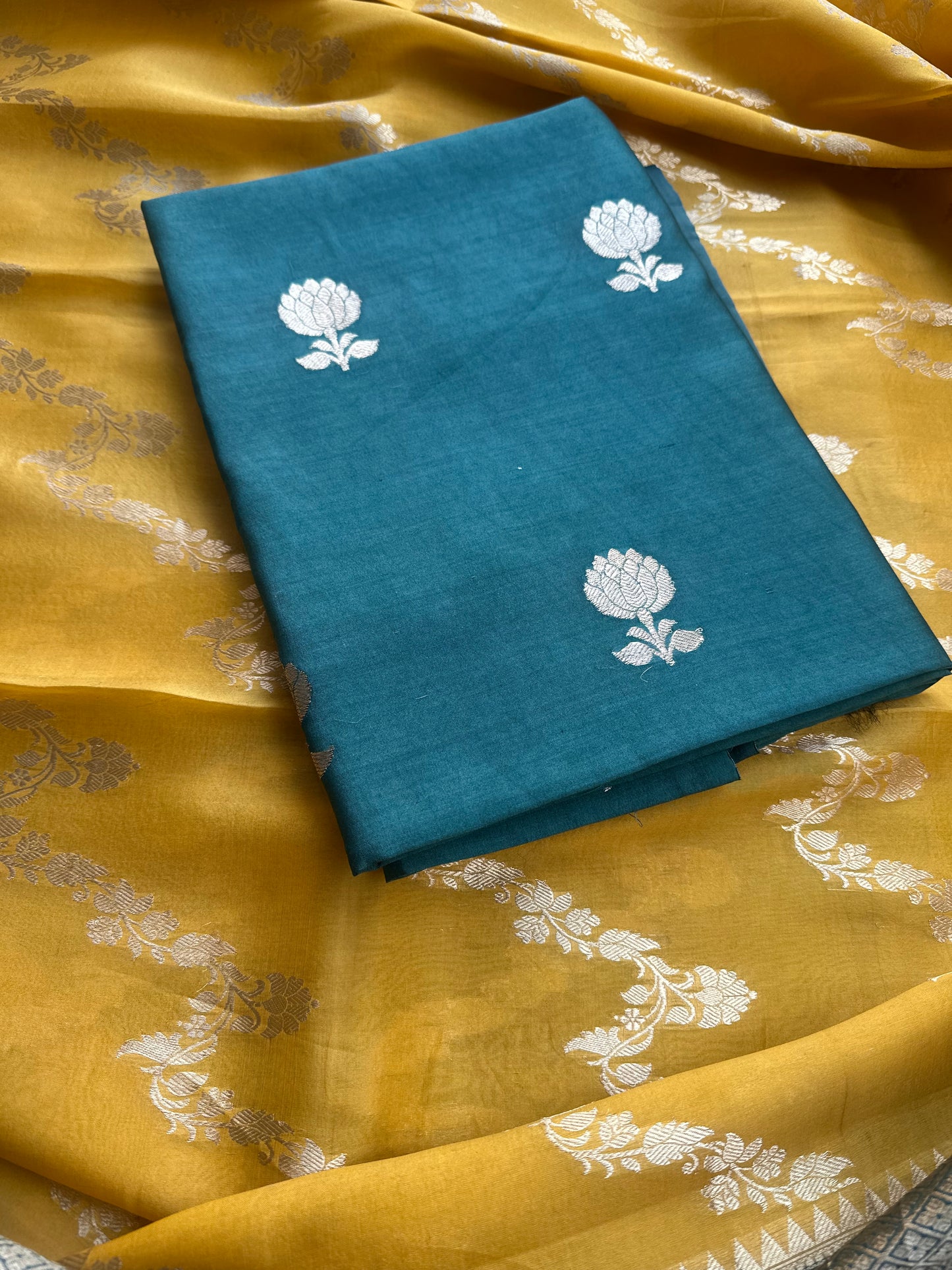 Green chiniya silk kurta, kora shaded dupatta, plain bottom.