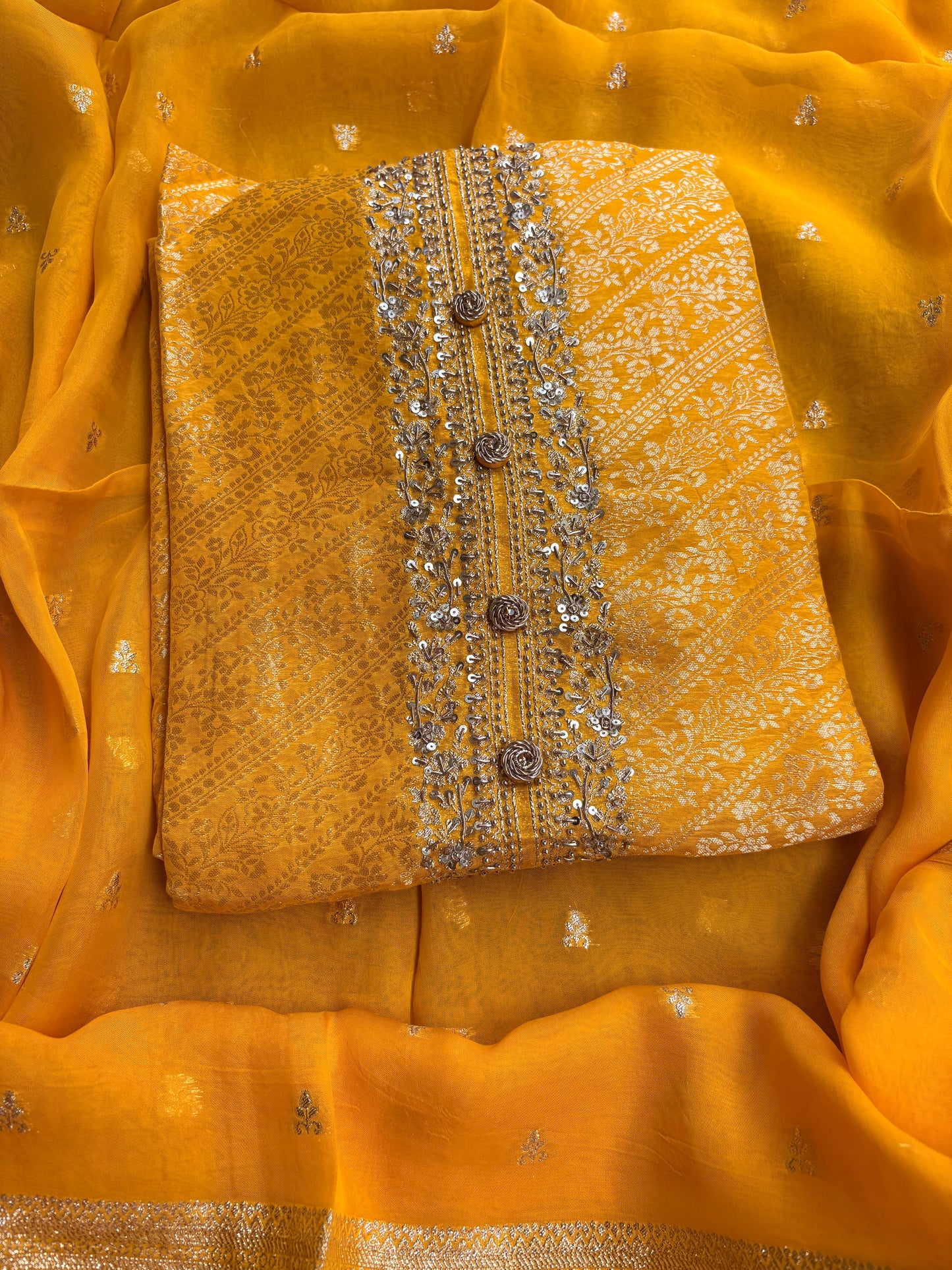 Yellow silk hand embroidered suit set.