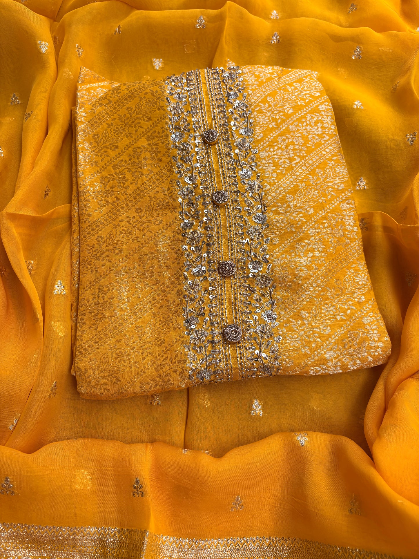 Yellow silk hand embroidered suit set.