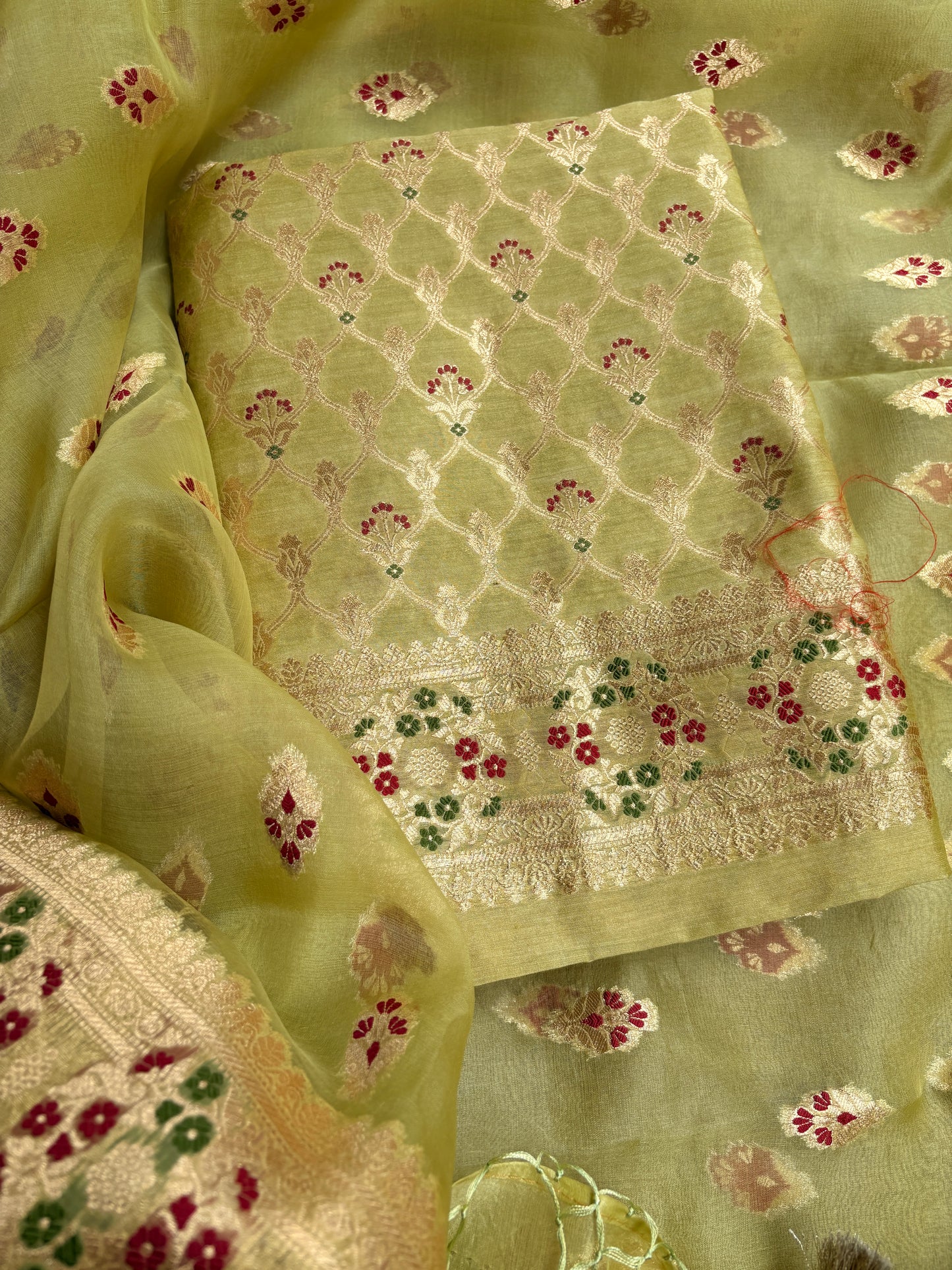 Green moonga silk kurta, kora kadhwa silk dupatta , plain bottom