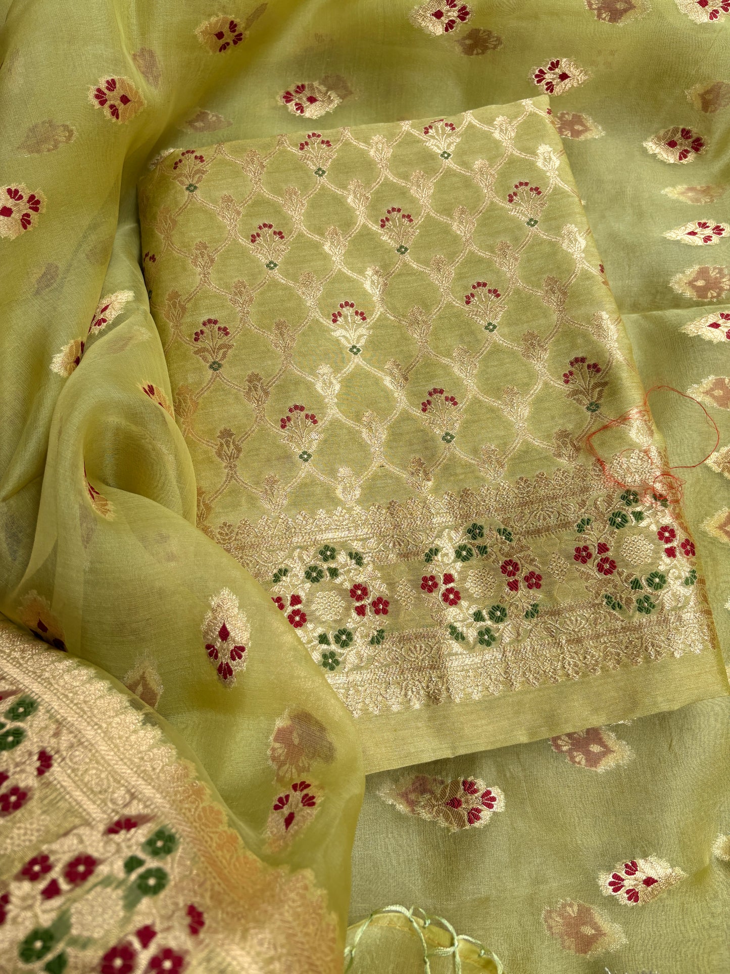 Green moonga silk kurta, kora kadhwa silk dupatta , plain bottom