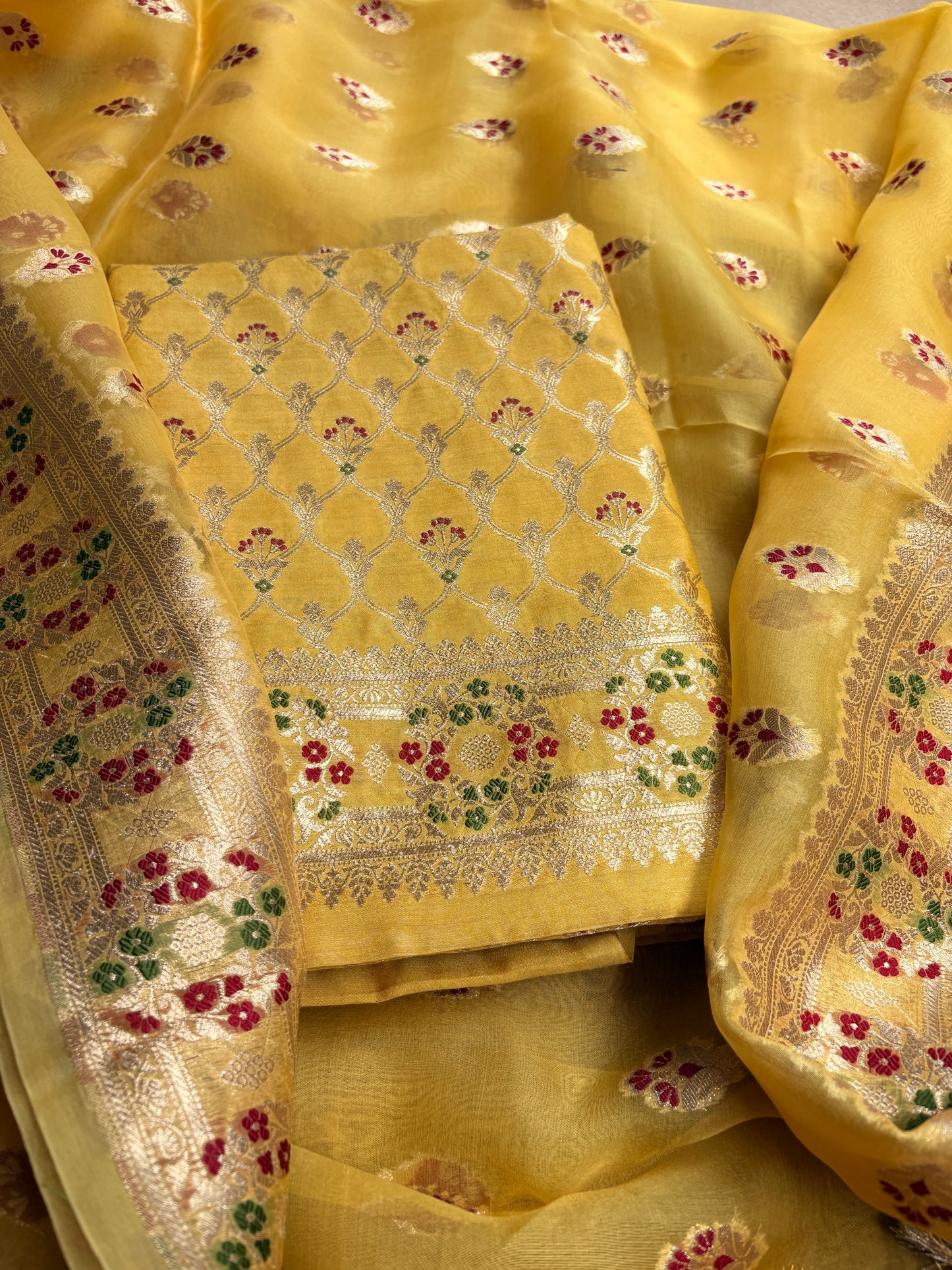 Yellow moonga silk kurta, kora kadhwa dupatta, plain bottom