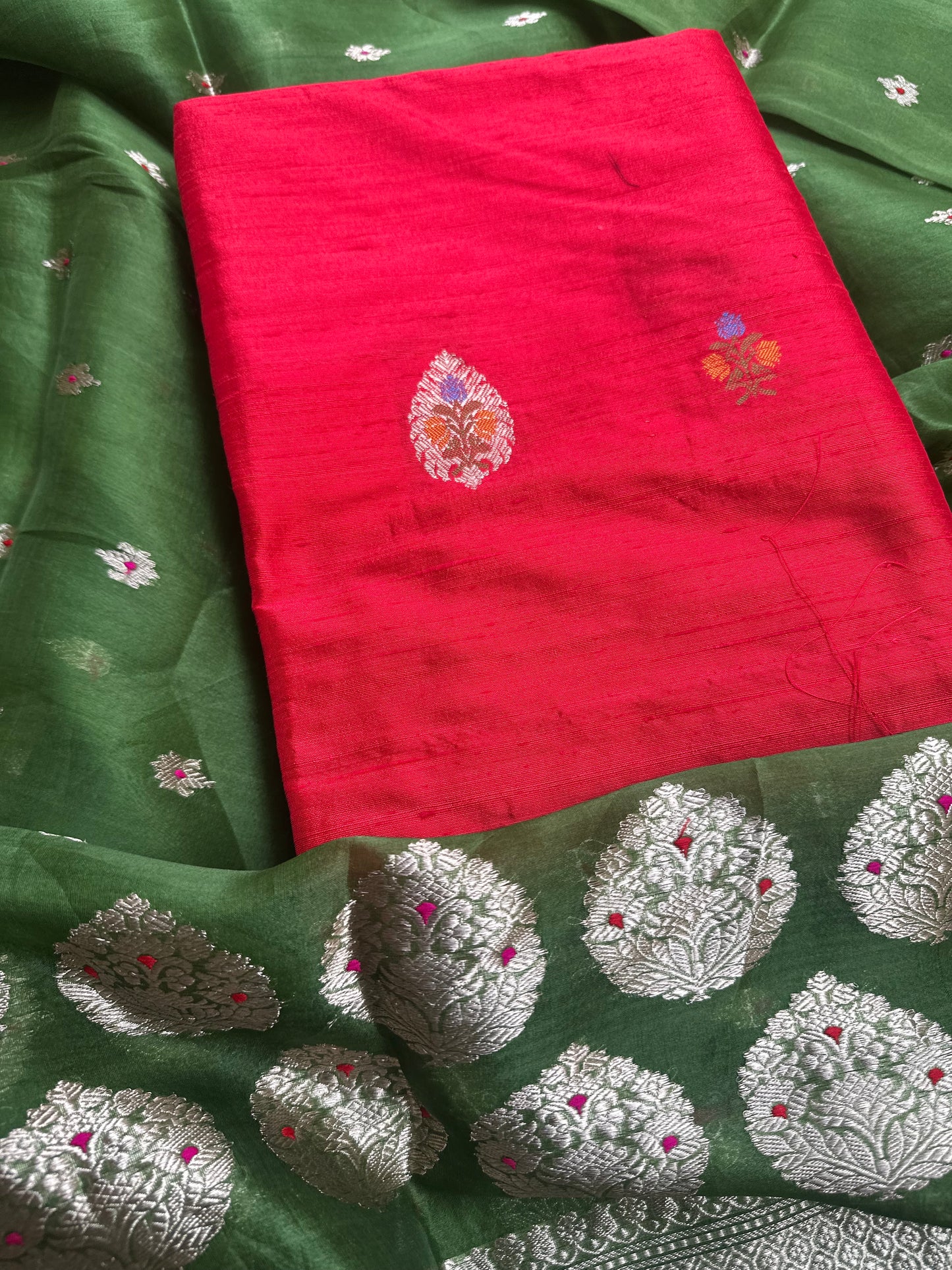 Red raw silk kurta, green kora silk dupatta, plain raw silk bottom