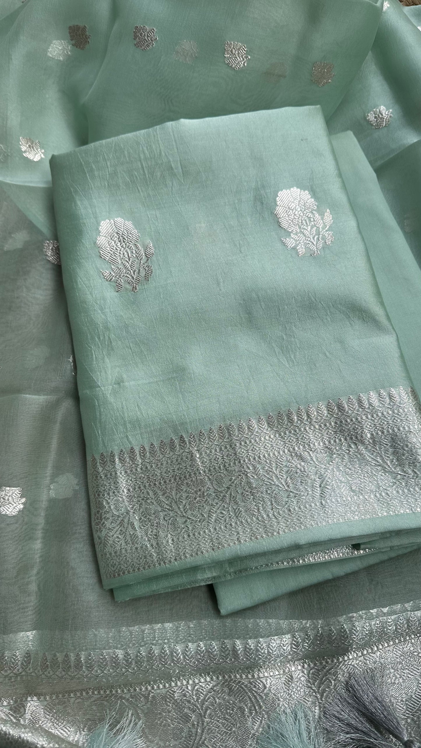 Pastel green pure silver chiniya silk suit, kora silk dupatta, plain silk bottom.