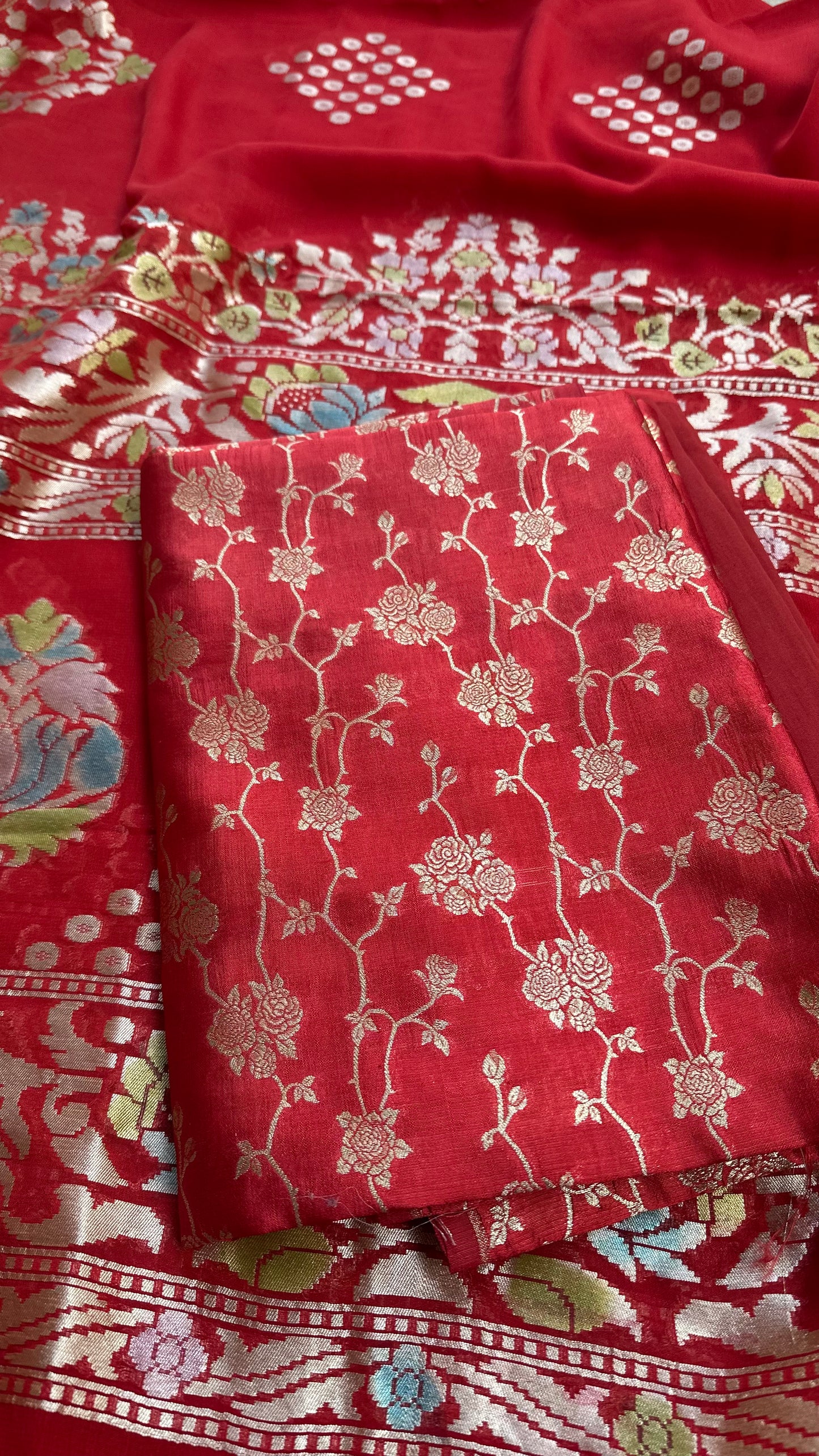 Red chiniya silk kurta,khaddi georgette meenadar dupatta. Plain bottom