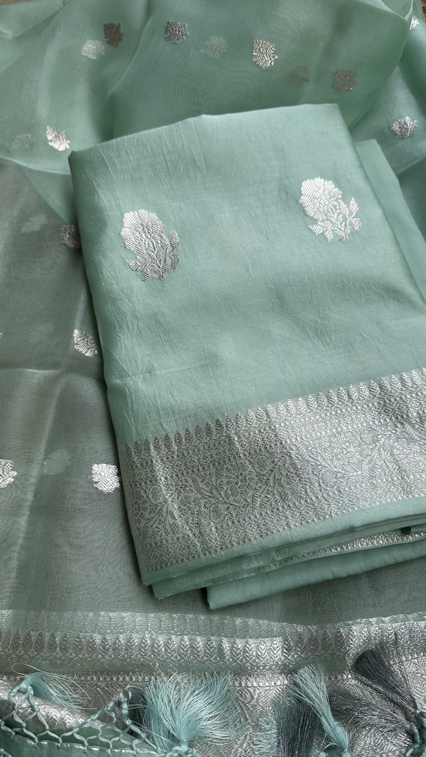 Pastel green pure silver chiniya silk suit, kora silk dupatta, plain silk bottom.