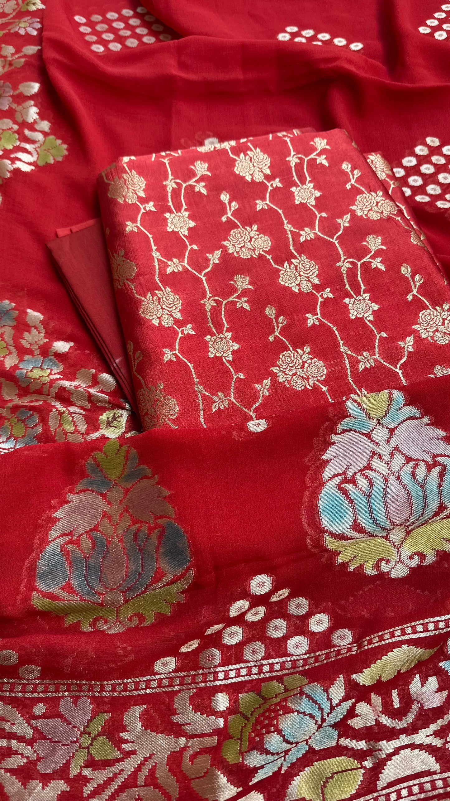 Red chiniya silk kurta,khaddi georgette meenadar dupatta. Plain bottom