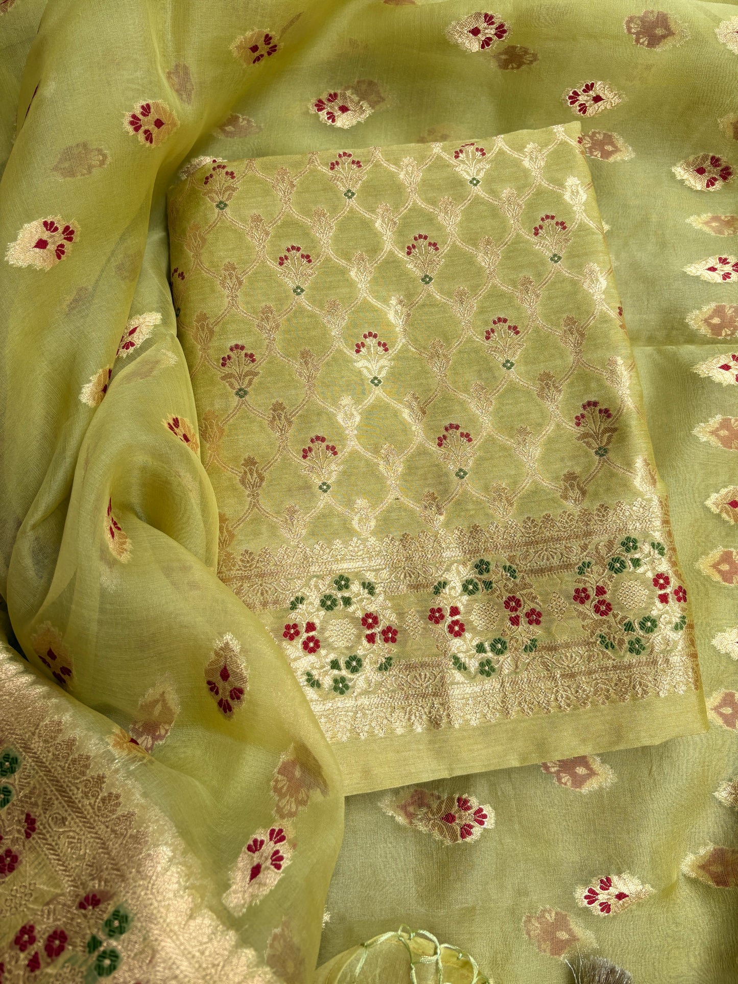 Green moonga silk kurta, kora kadhwa silk dupatta , plain bottom