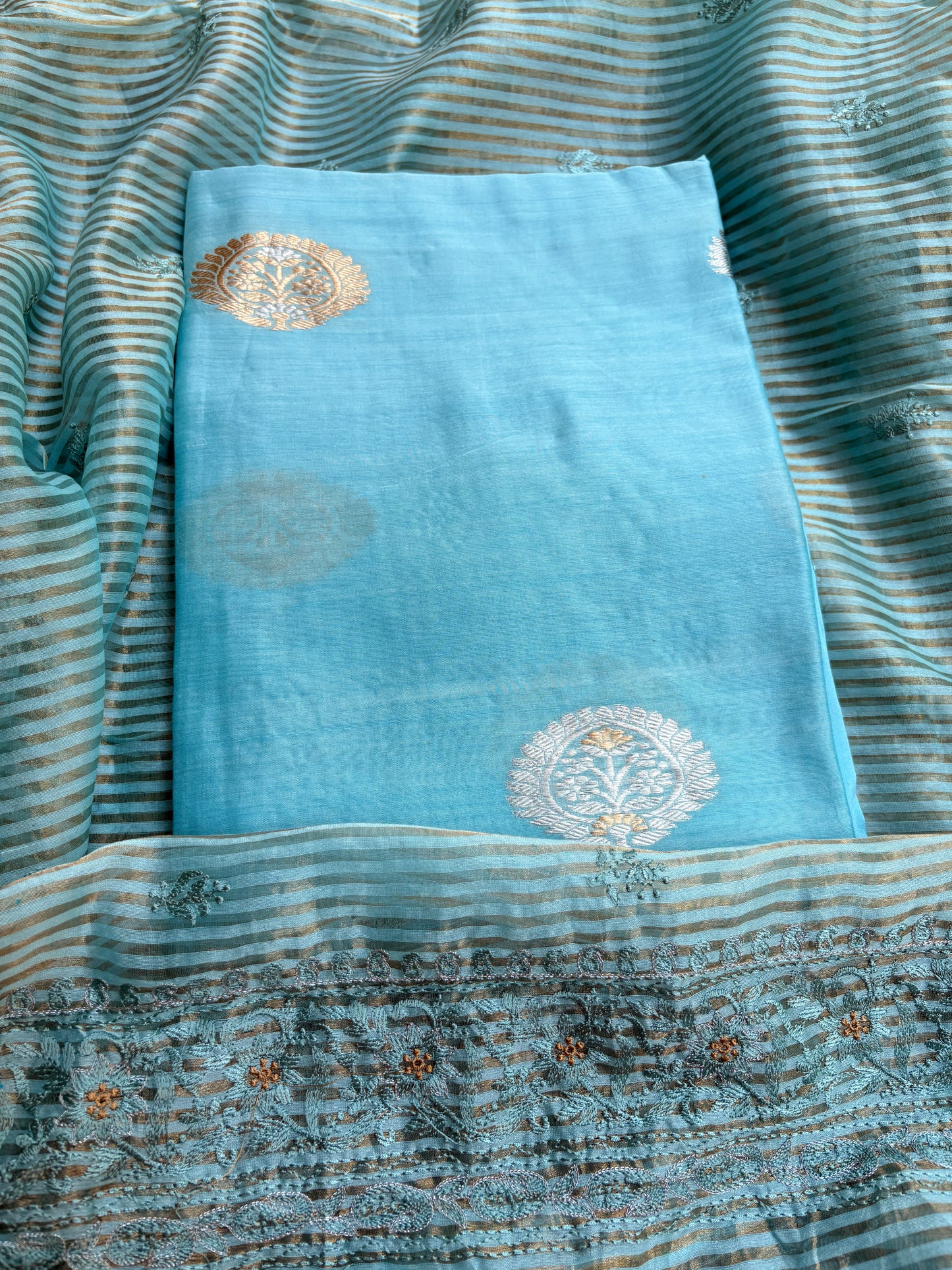 Blue handloom silk kurta, bottom tissue kadhwa dupatta.