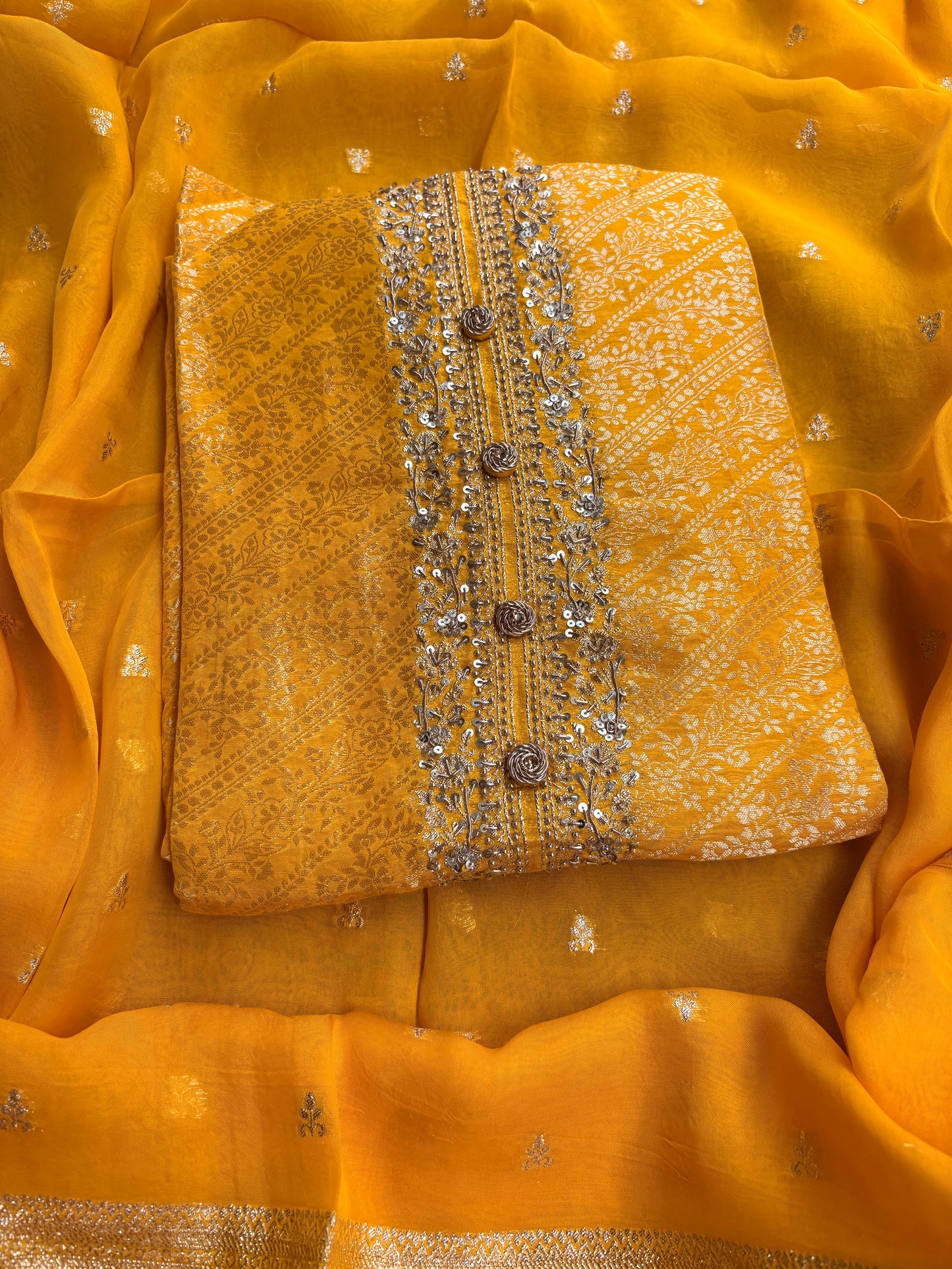 Yellow silk hand embroidered suit set.