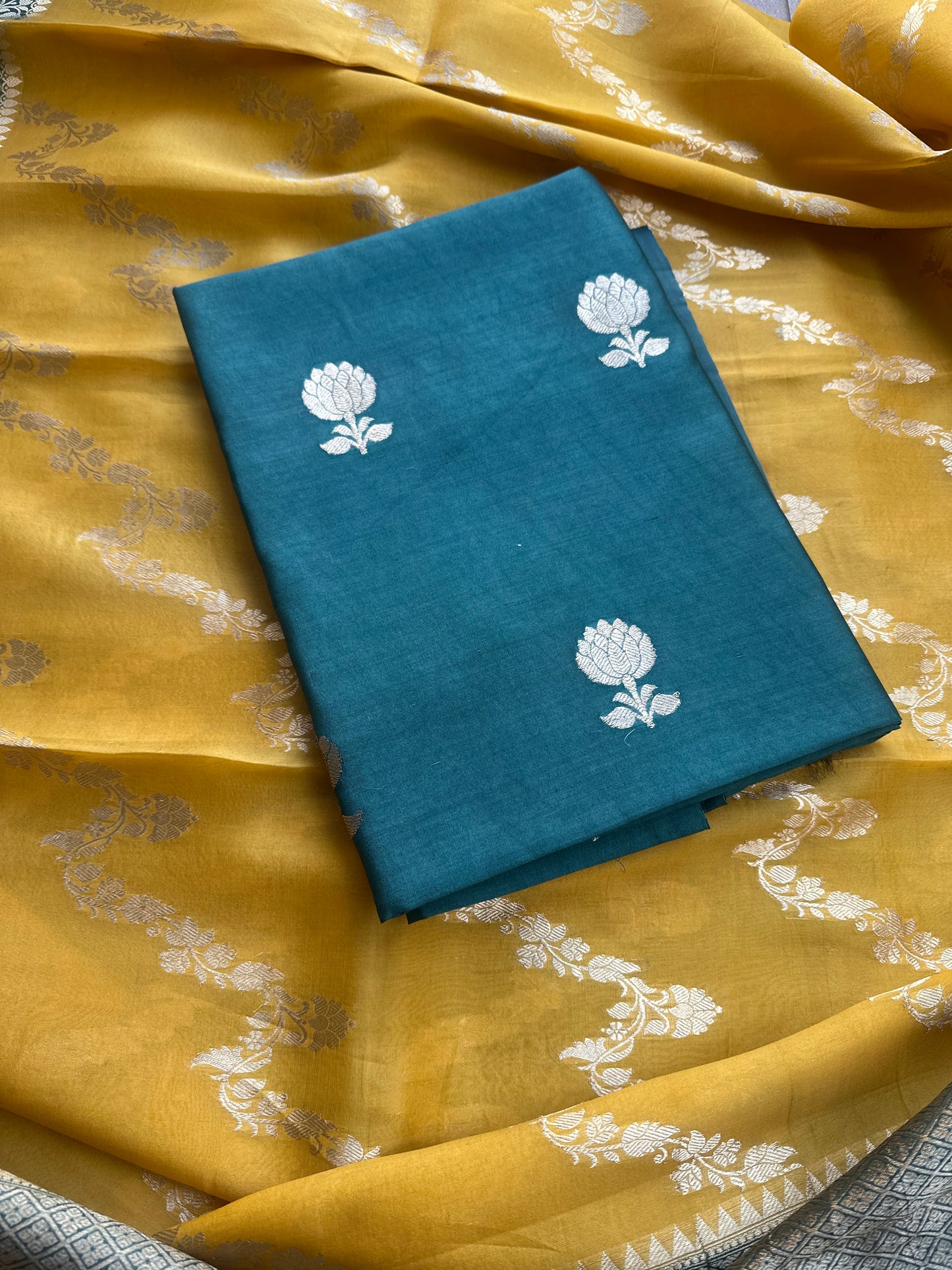 Green chiniya silk kurta, kora shaded dupatta, plain bottom.