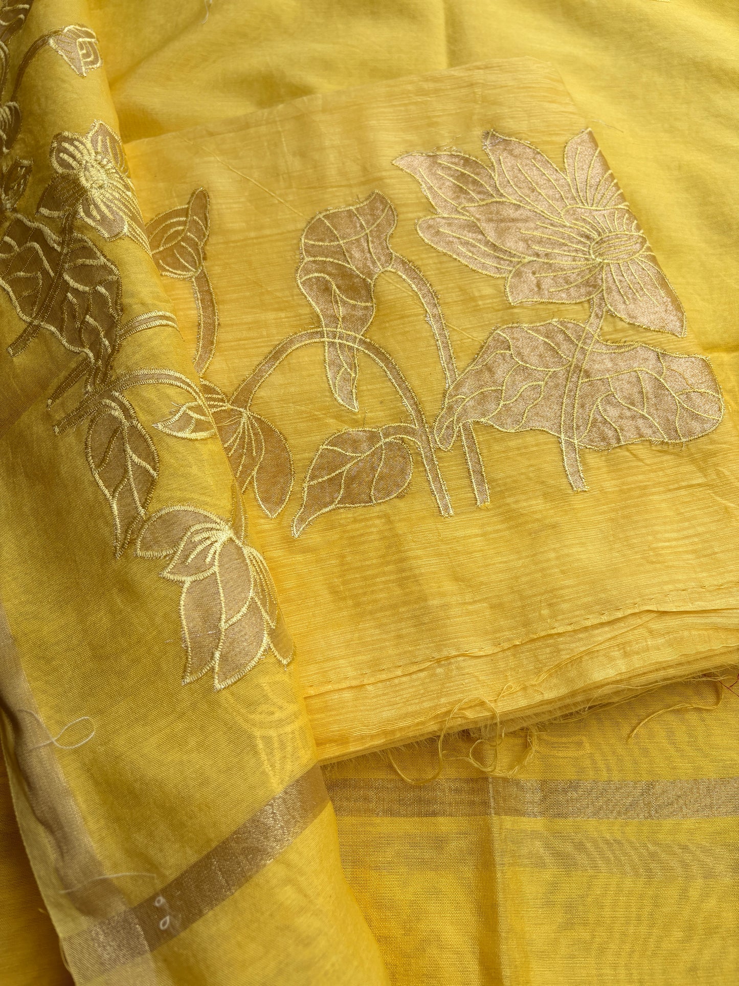 Yellow mul Chanderi appliqué work suit set