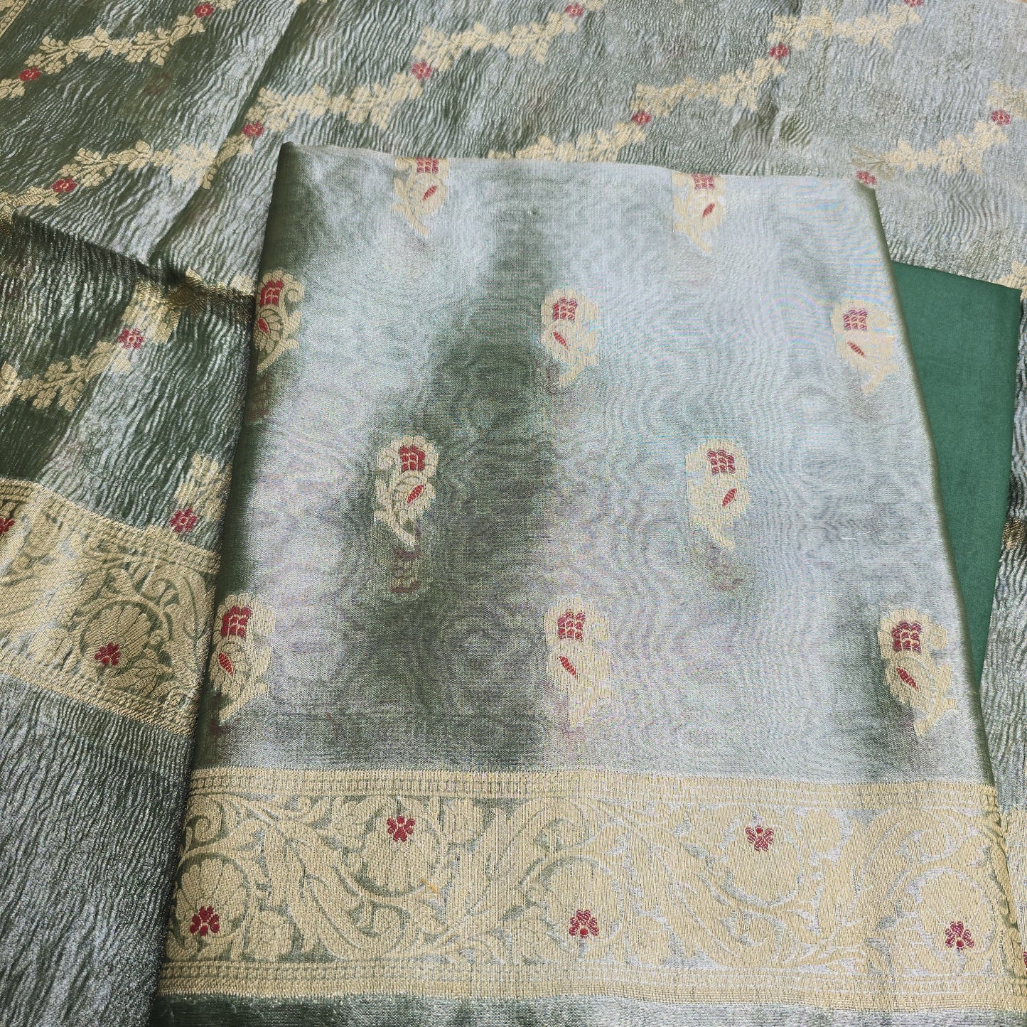 Green tissue meenadar kurta, crush tissue dupatta , cotton silk bottom.