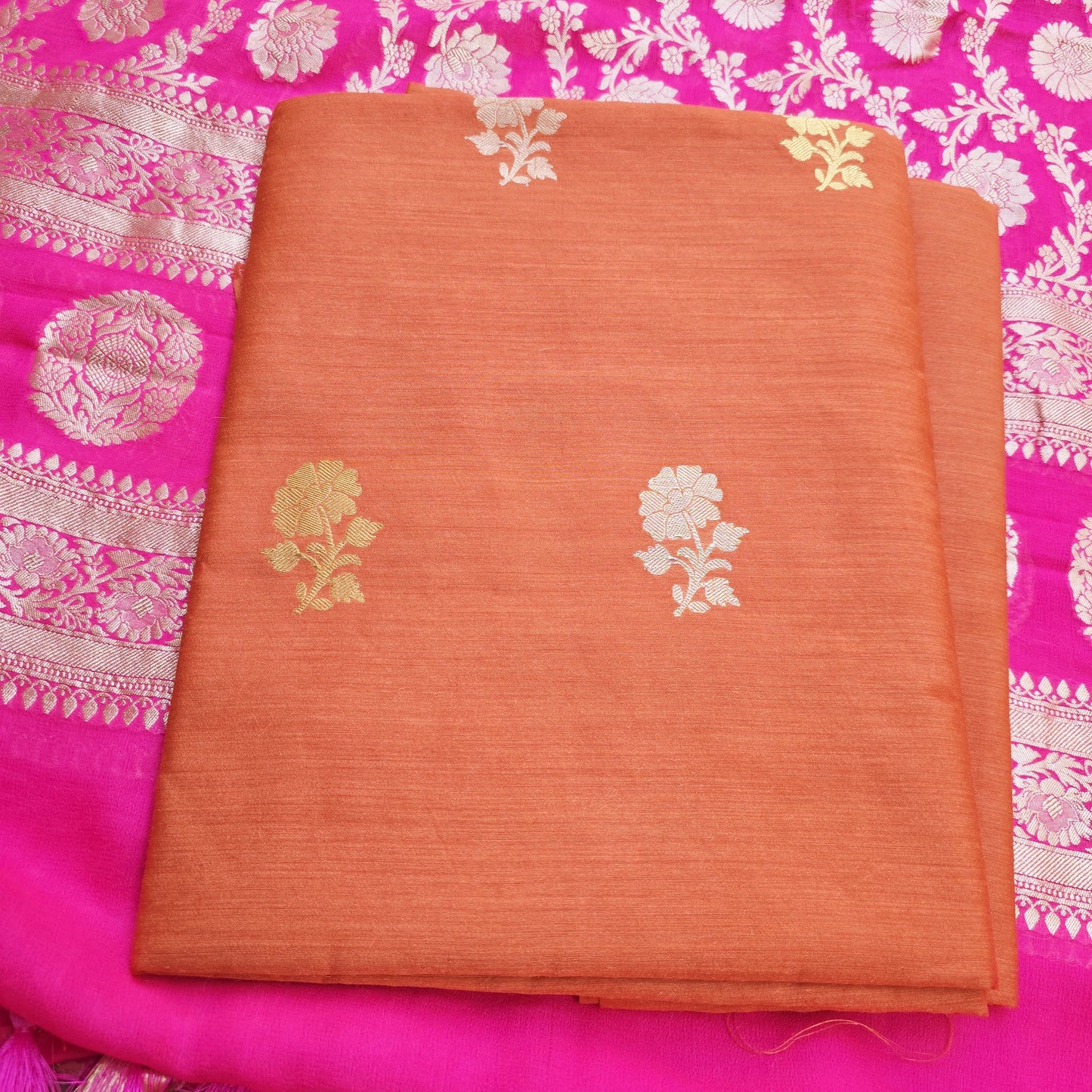 Rust orange moonga silk kurta, pink georgette dupatta