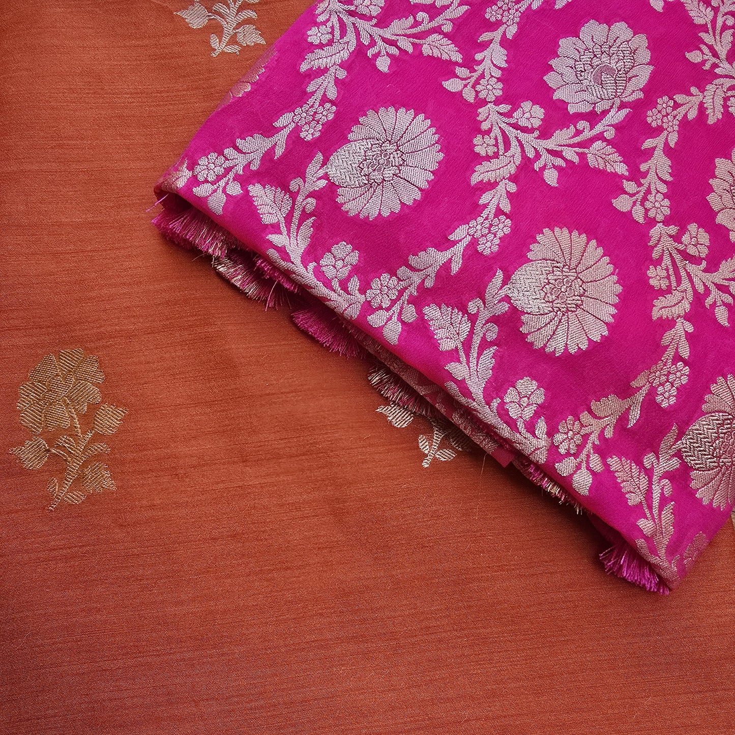 Rust orange moonga silk kurta, pink georgette dupatta