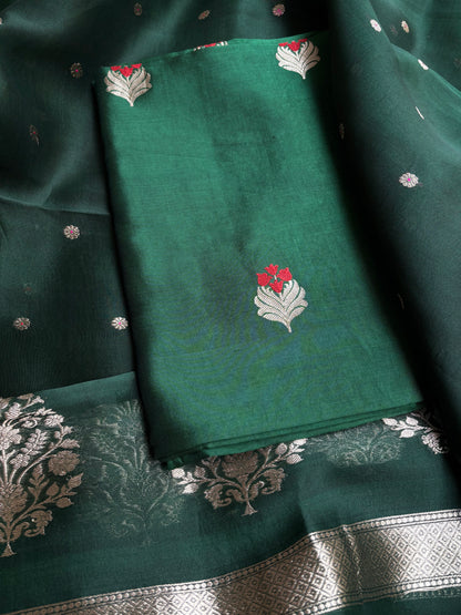 Bottle green chiniya silk kurta, kora silk dupatta, plain bottom.