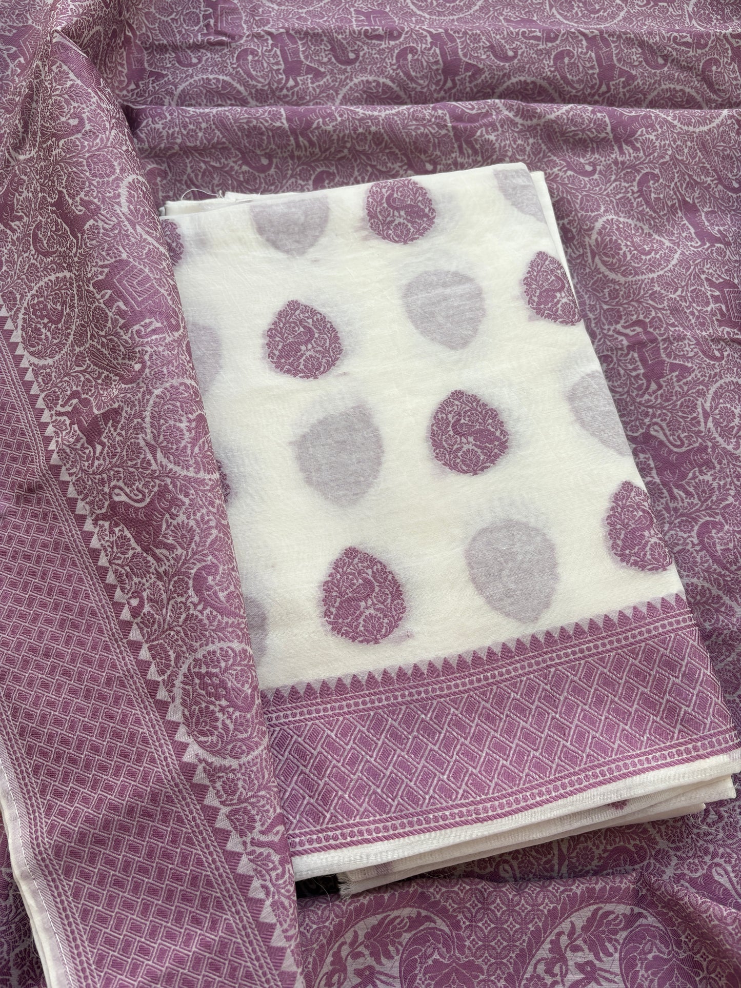 White Chanderi base with full jaal weaving dupatta